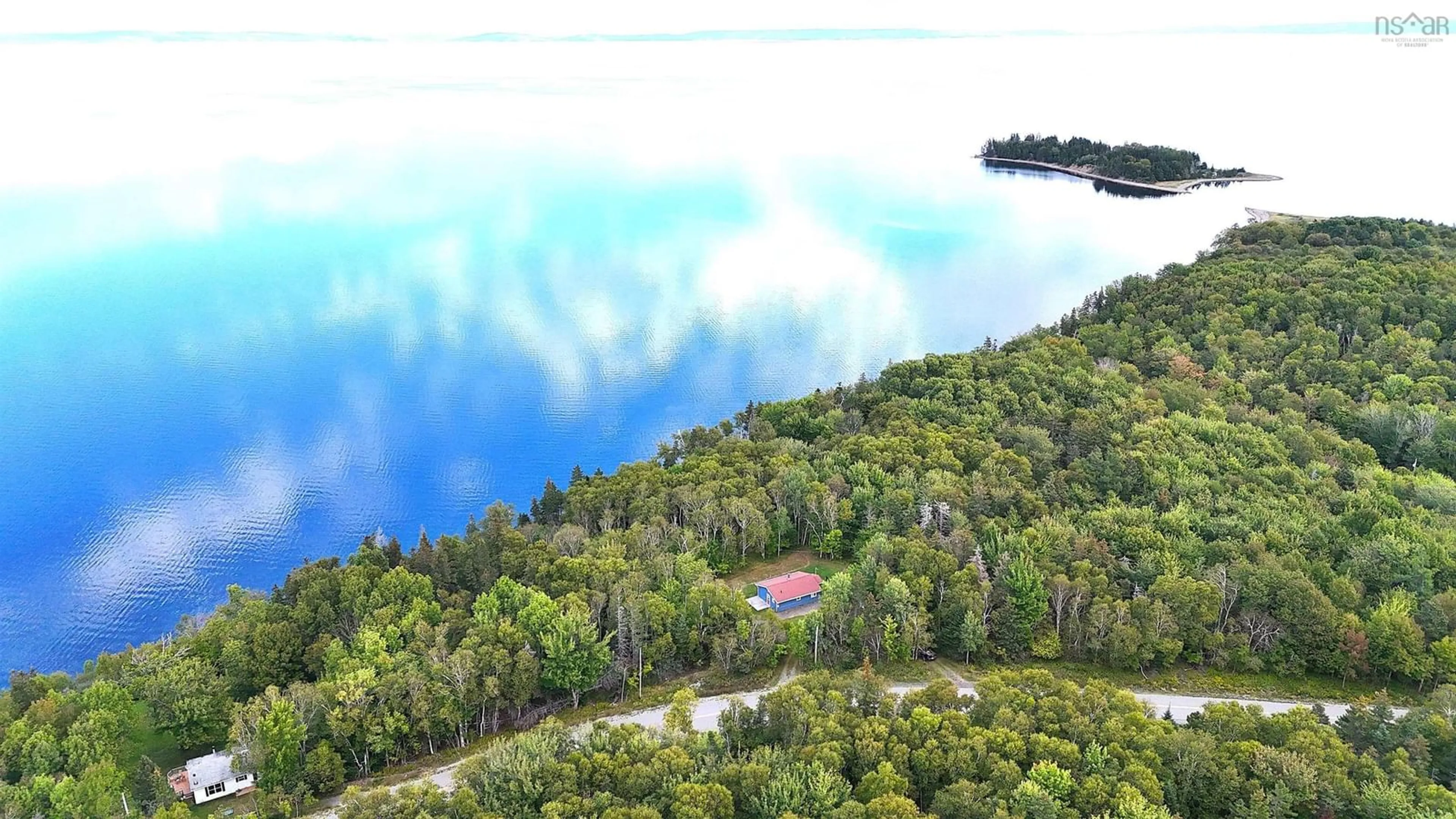A pic from outside/outdoor area/front of a property/back of a property/a pic from drone, water/lake/river/ocean view for 5735 West Bay Rd, Roberta Nova Scotia B0E 3K0