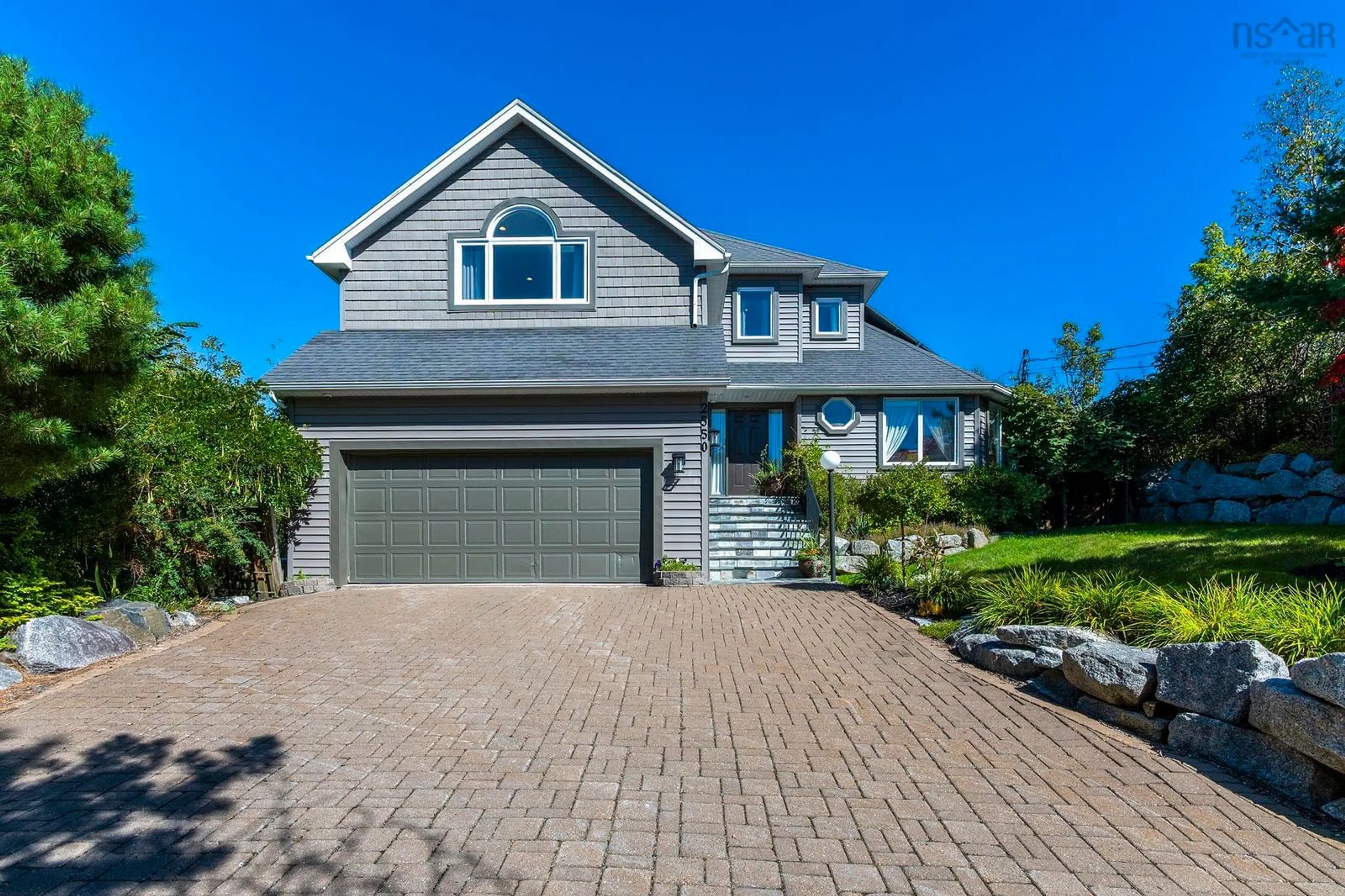 Home with vinyl exterior material, street for 2550 Purcells Cove Rd, Halifax Nova Scotia B3P 2E6
