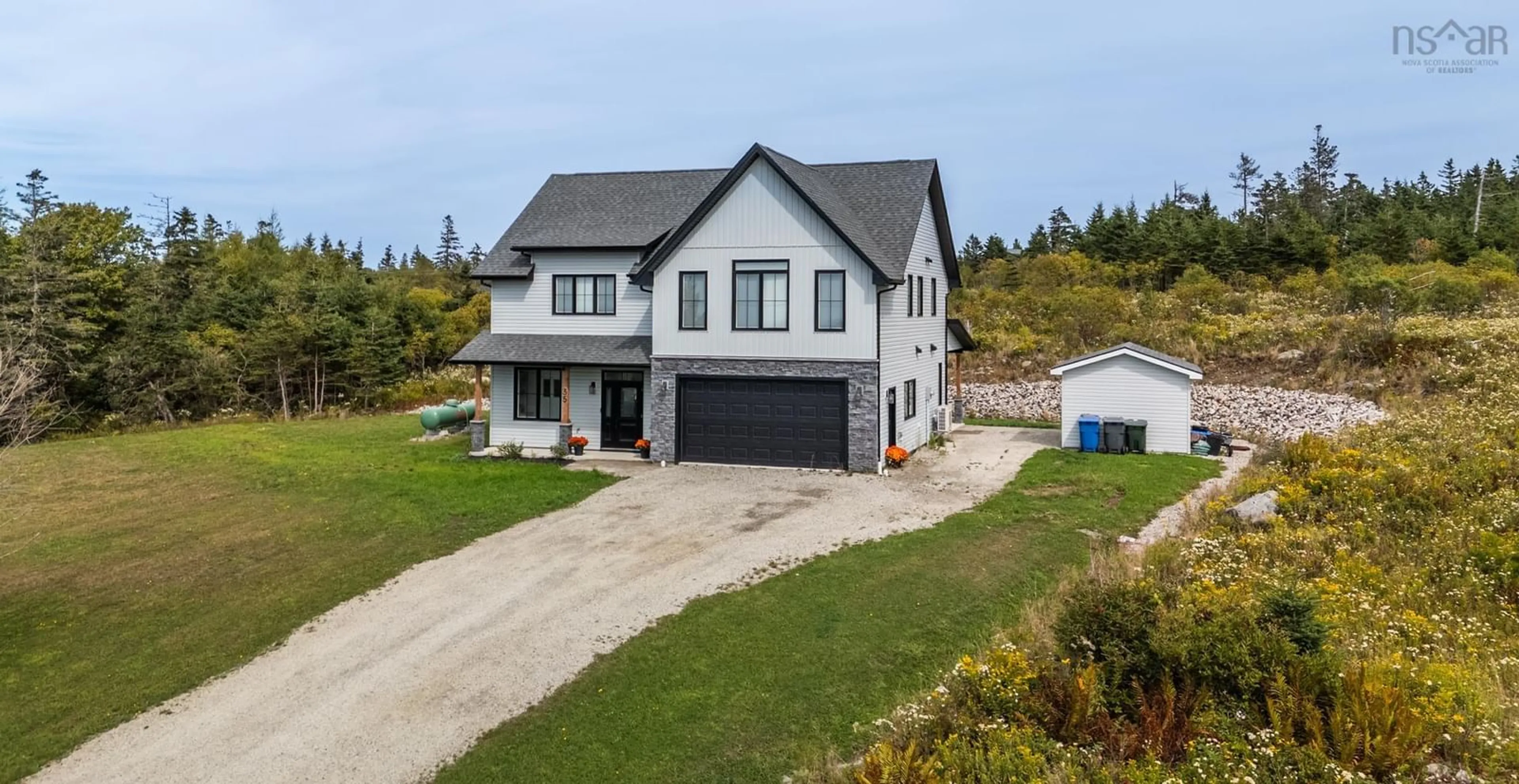 A pic from outside/outdoor area/front of a property/back of a property/a pic from drone, unknown for 35 Seeland Ave, Brooklyn Nova Scotia B5A 0E2