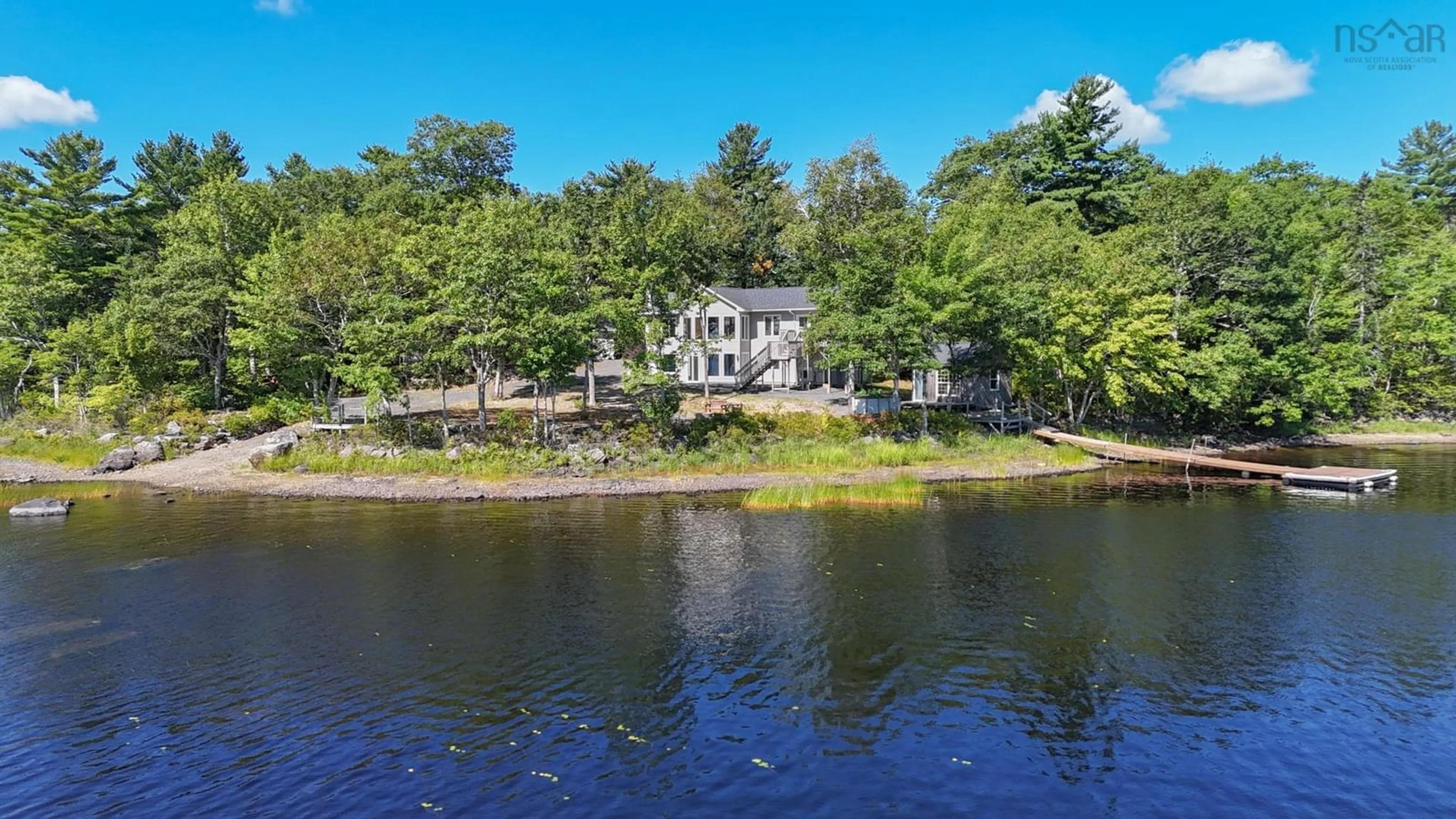 A pic from outside/outdoor area/front of a property/back of a property/a pic from drone, water/lake/river/ocean view for 49 Loop Lane, Labelle Nova Scotia B0T 1E0
