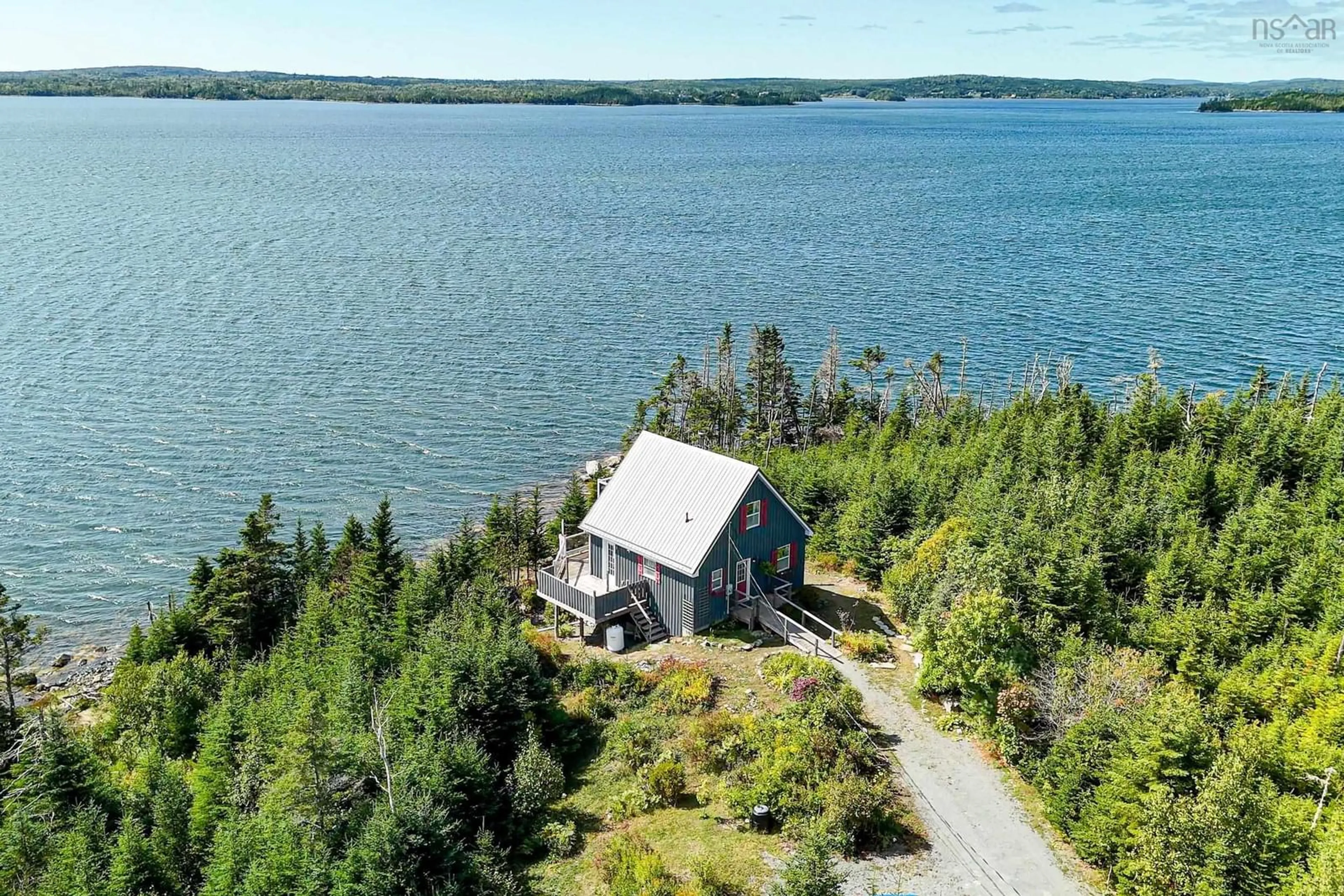 A pic from outside/outdoor area/front of a property/back of a property/a pic from drone, water/lake/river/ocean view for 860 East Jeddore Rd, East Jeddore Nova Scotia B0J 2L0