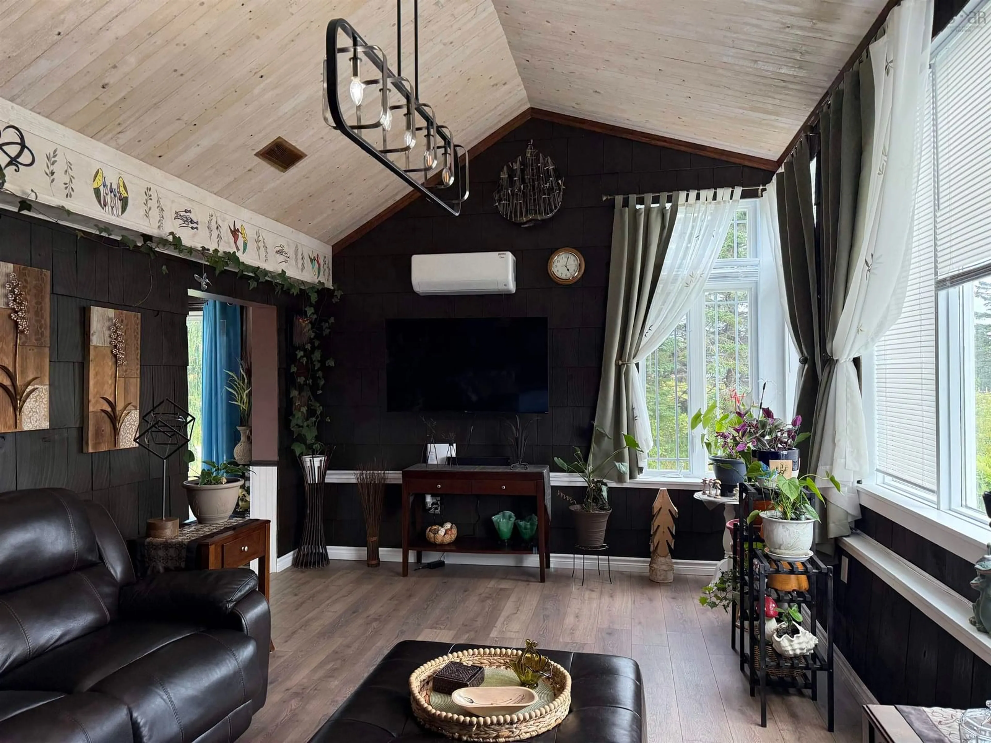 Living room with furniture, wood/laminate floor for 19 Dick Giffins Hill, Goldboro Nova Scotia B0H 1L0