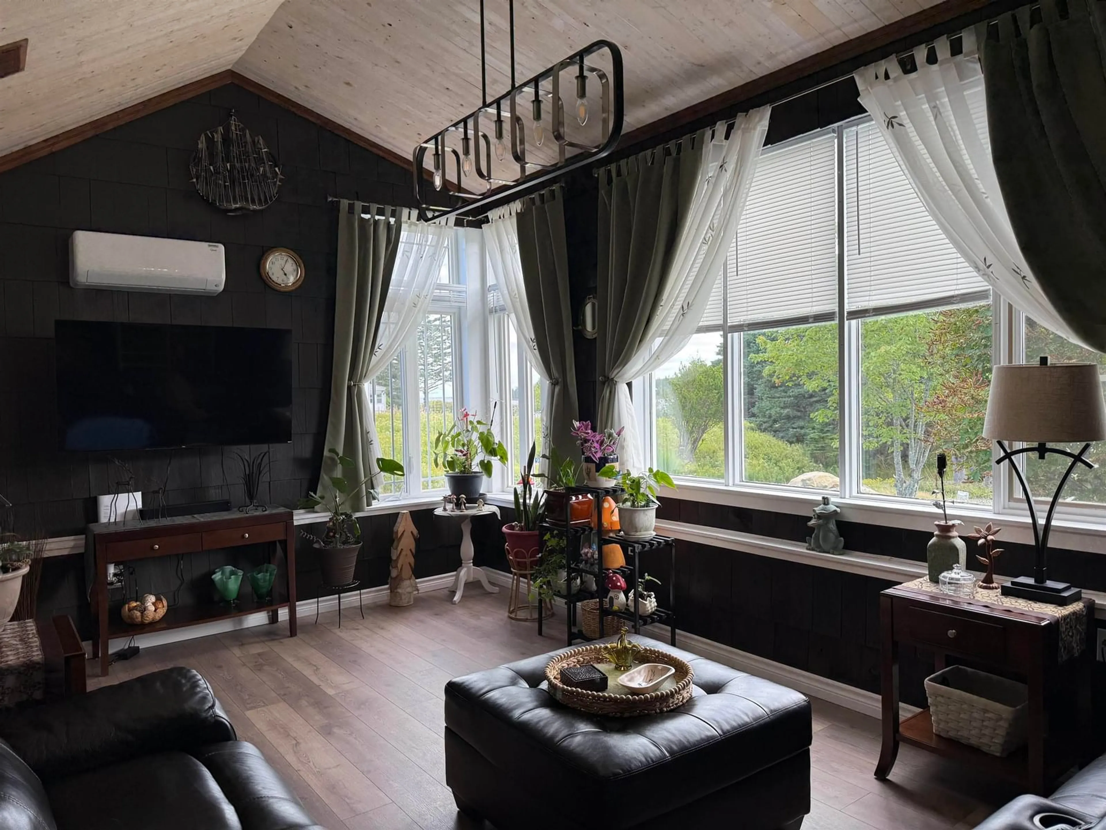 Living room with furniture, wood/laminate floor for 19 Dick Giffins Hill, Goldboro Nova Scotia B0H 1L0