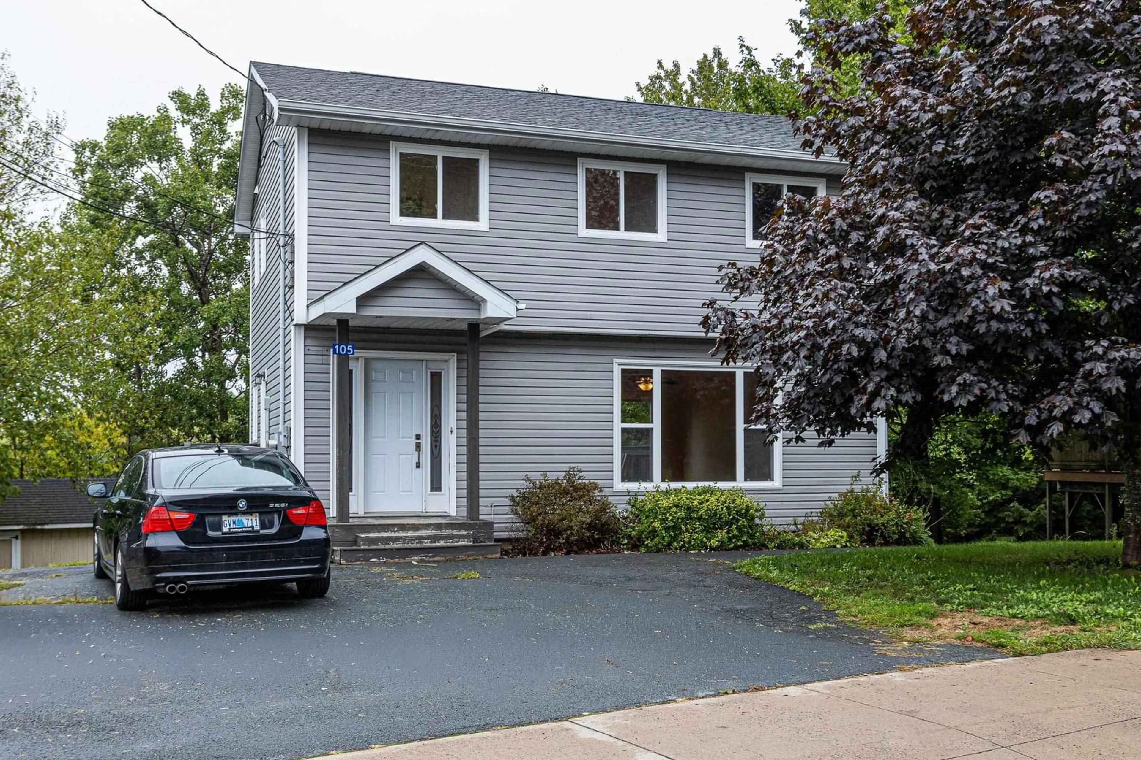 Home with vinyl exterior material, street for 105 Smokey Dr, Lower Sackville Nova Scotia B4C 3B5