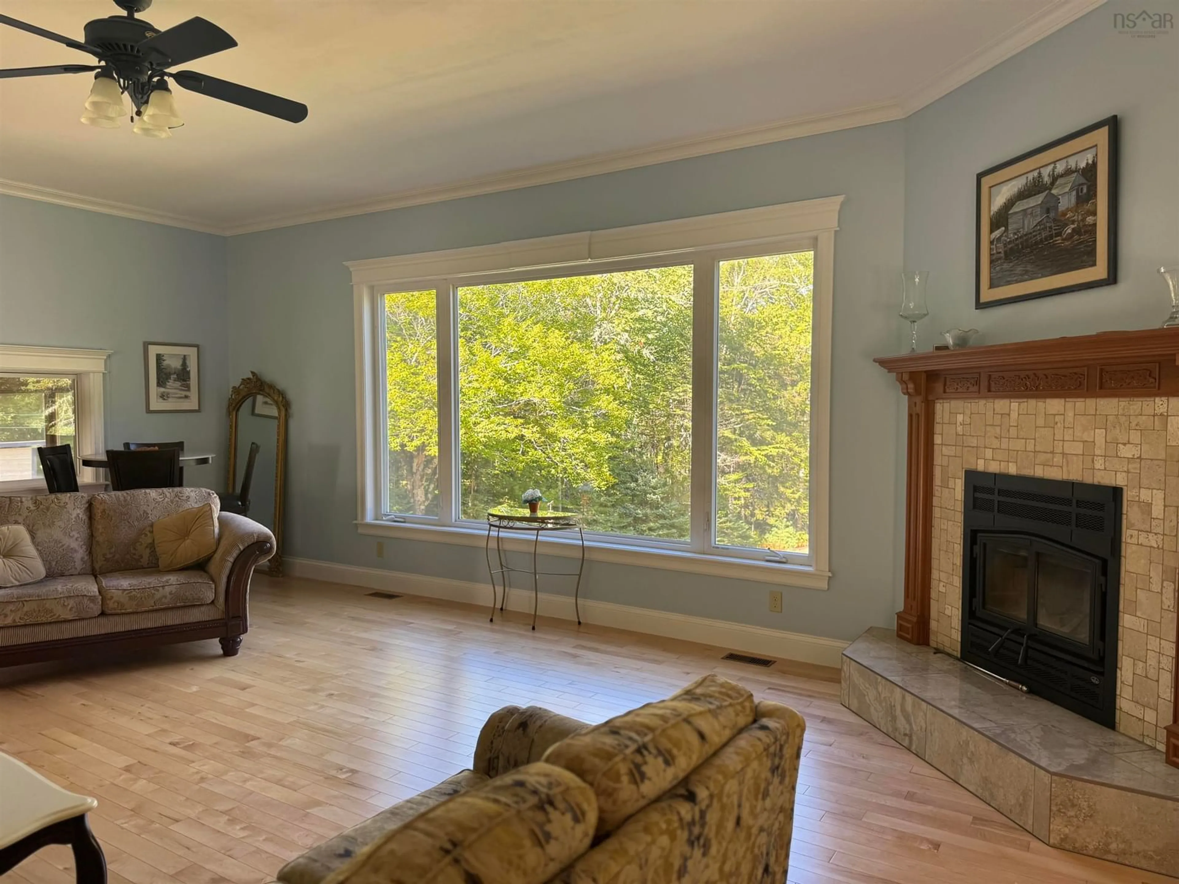 Living room with furniture, wood/laminate floor for 590 Gilberts Lane, Maplewood Nova Scotia B0R 1A0