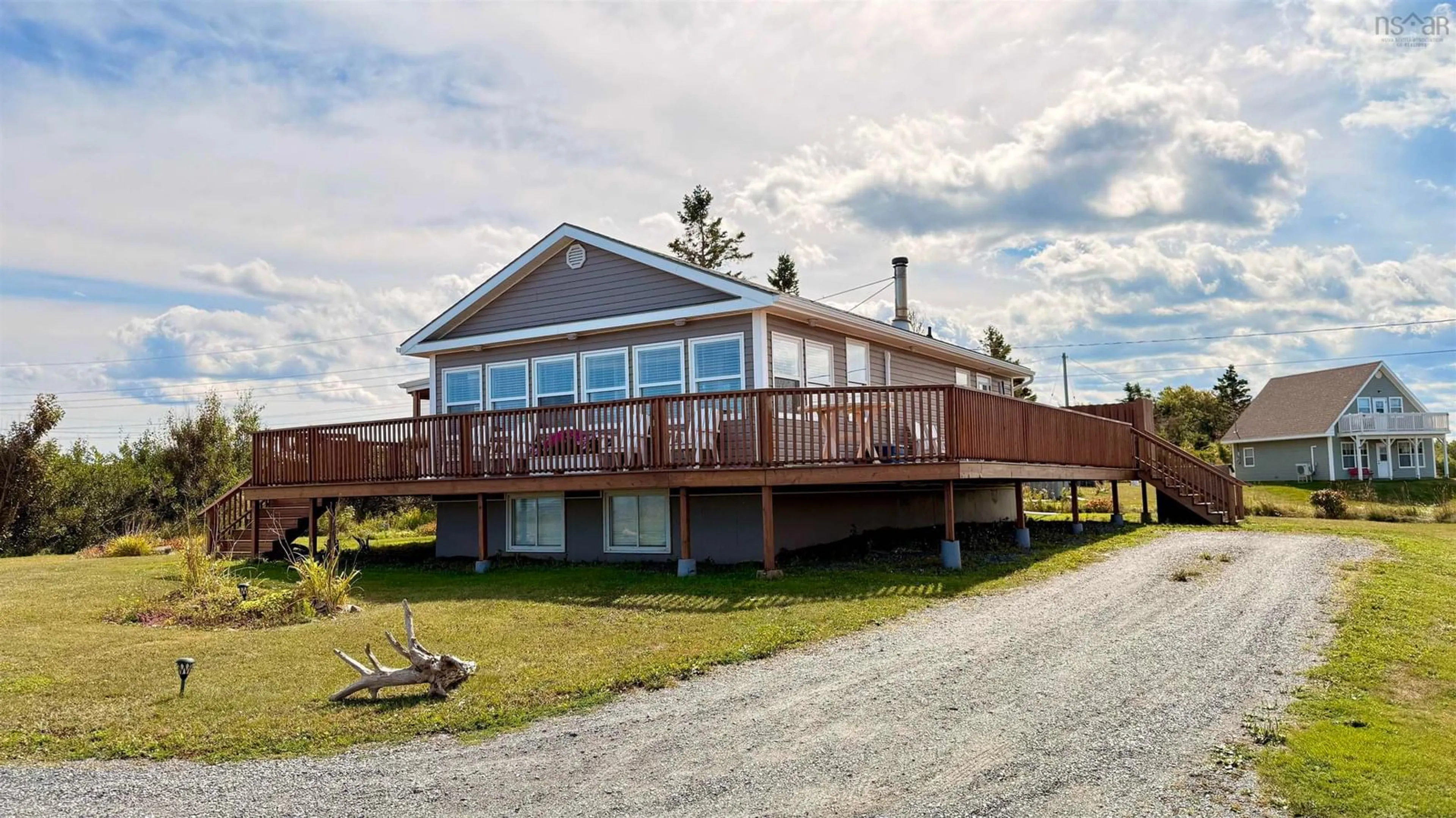 A pic from outside/outdoor area/front of a property/back of a property/a pic from drone, water/lake/river/ocean view for 6 Seashell Lane, Caribou River Nova Scotia B0K 1H0
