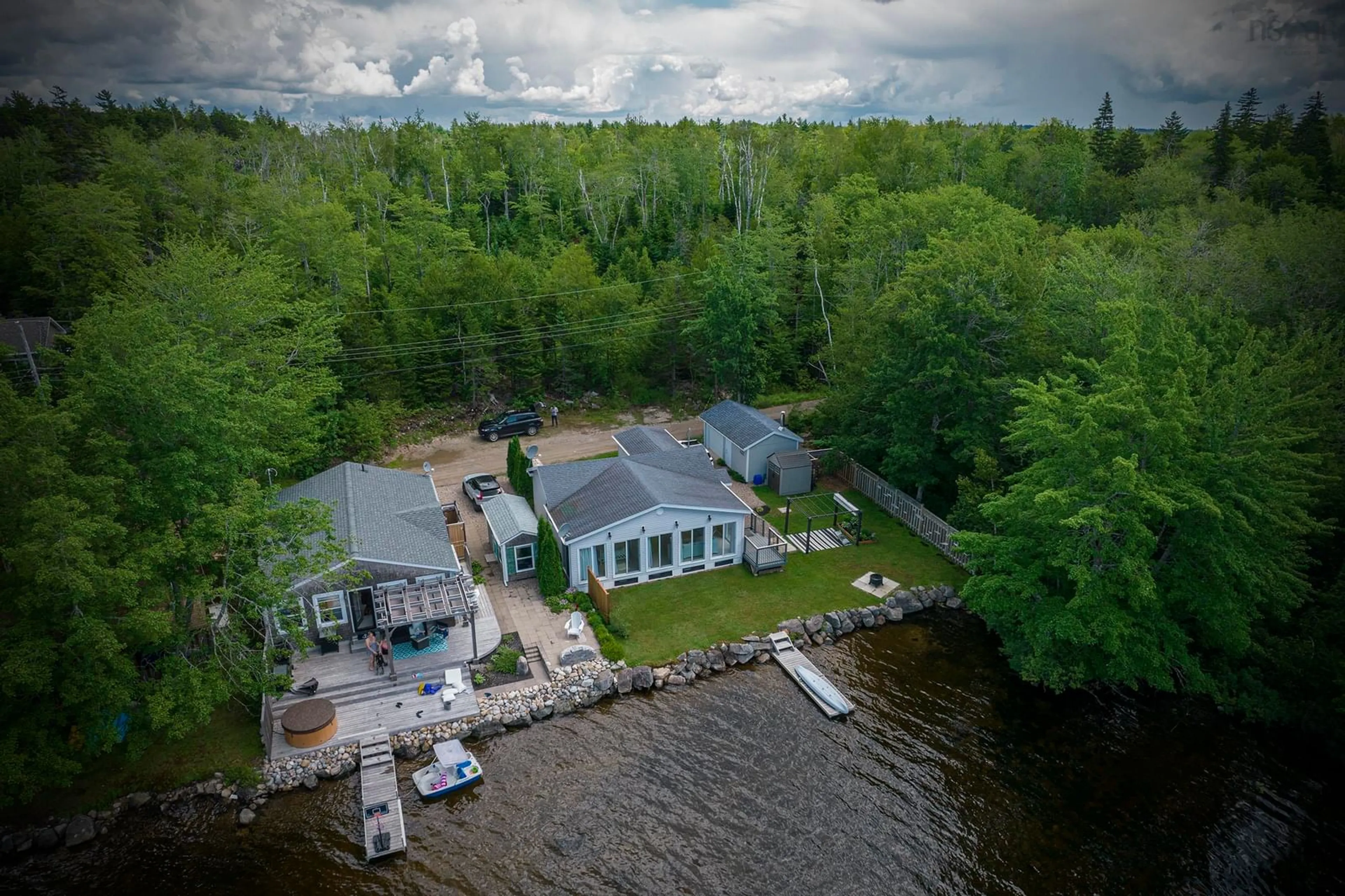 A pic from outside/outdoor area/front of a property/back of a property/a pic from drone, water/lake/river/ocean view for 73 Q-12 Rd, Lake George Nova Scotia B0P 1C0