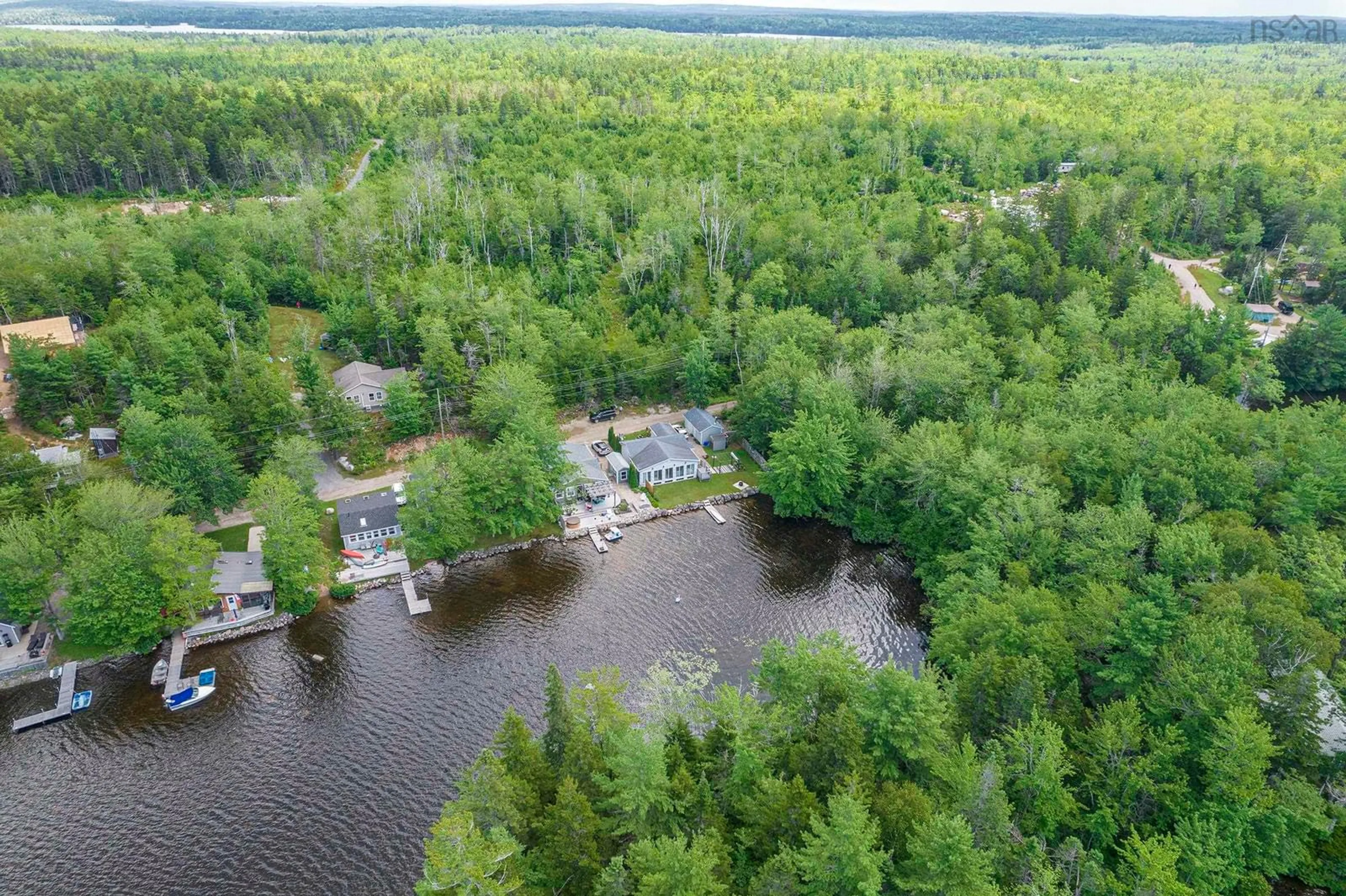 A pic from outside/outdoor area/front of a property/back of a property/a pic from drone, water/lake/river/ocean view for 73 Q-12 Rd, Lake George Nova Scotia B0P 1C0
