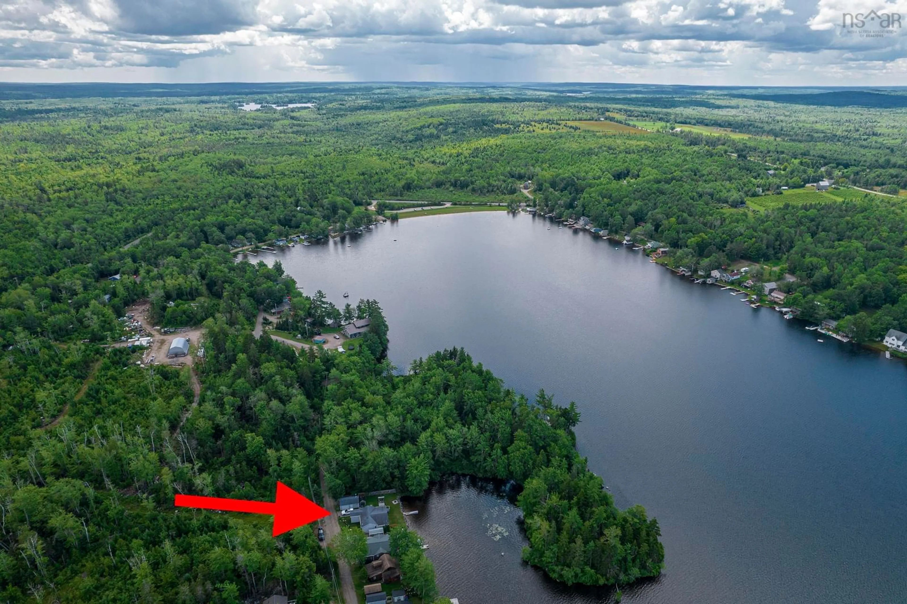 A pic from outside/outdoor area/front of a property/back of a property/a pic from drone, water/lake/river/ocean view for 73 Q-12 Rd, Lake George Nova Scotia B0P 1C0