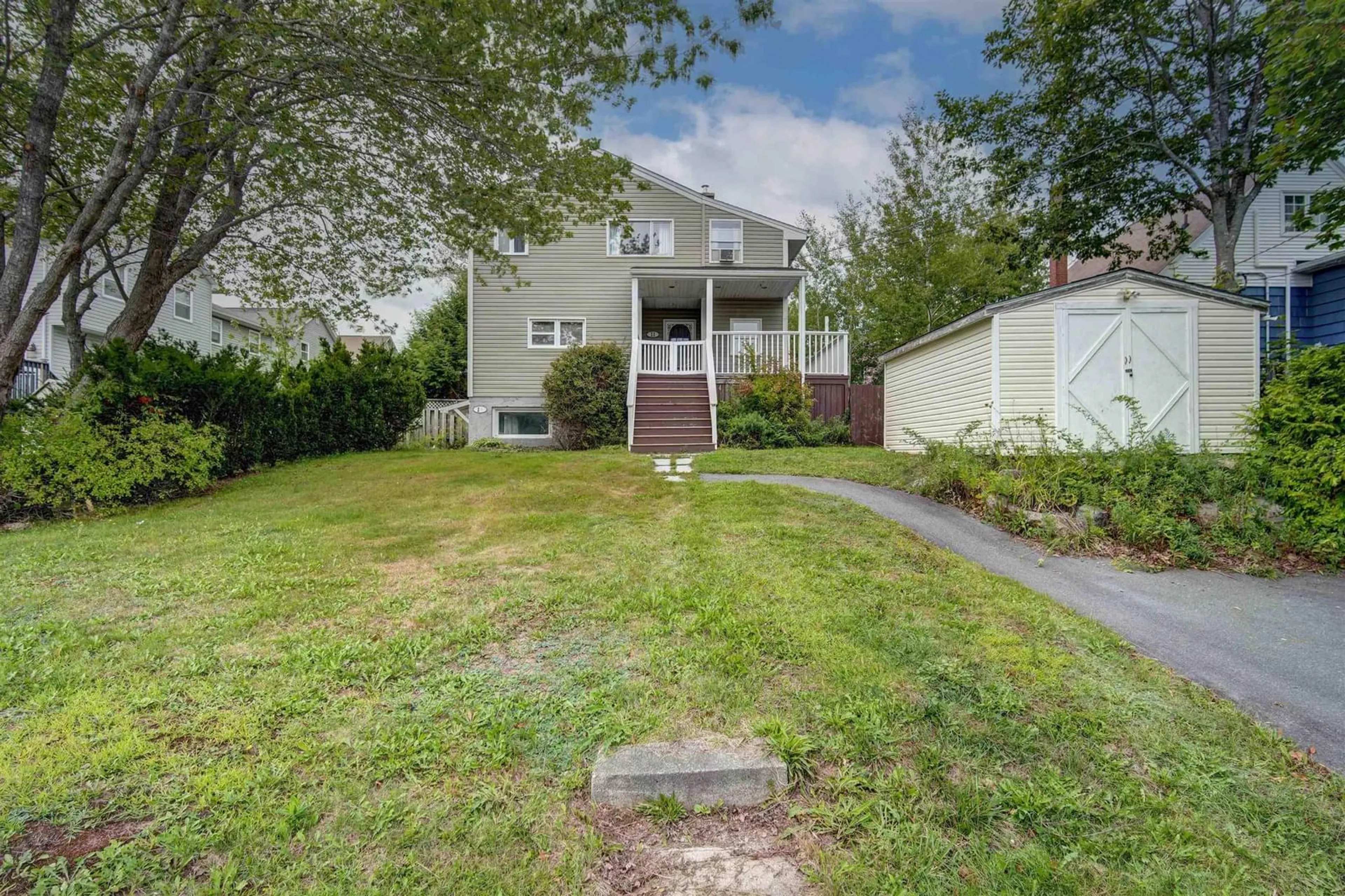 A pic from outside/outdoor area/front of a property/back of a property/a pic from drone, street for 11 Inspector Crt, Spryfield Nova Scotia B3R 1R8