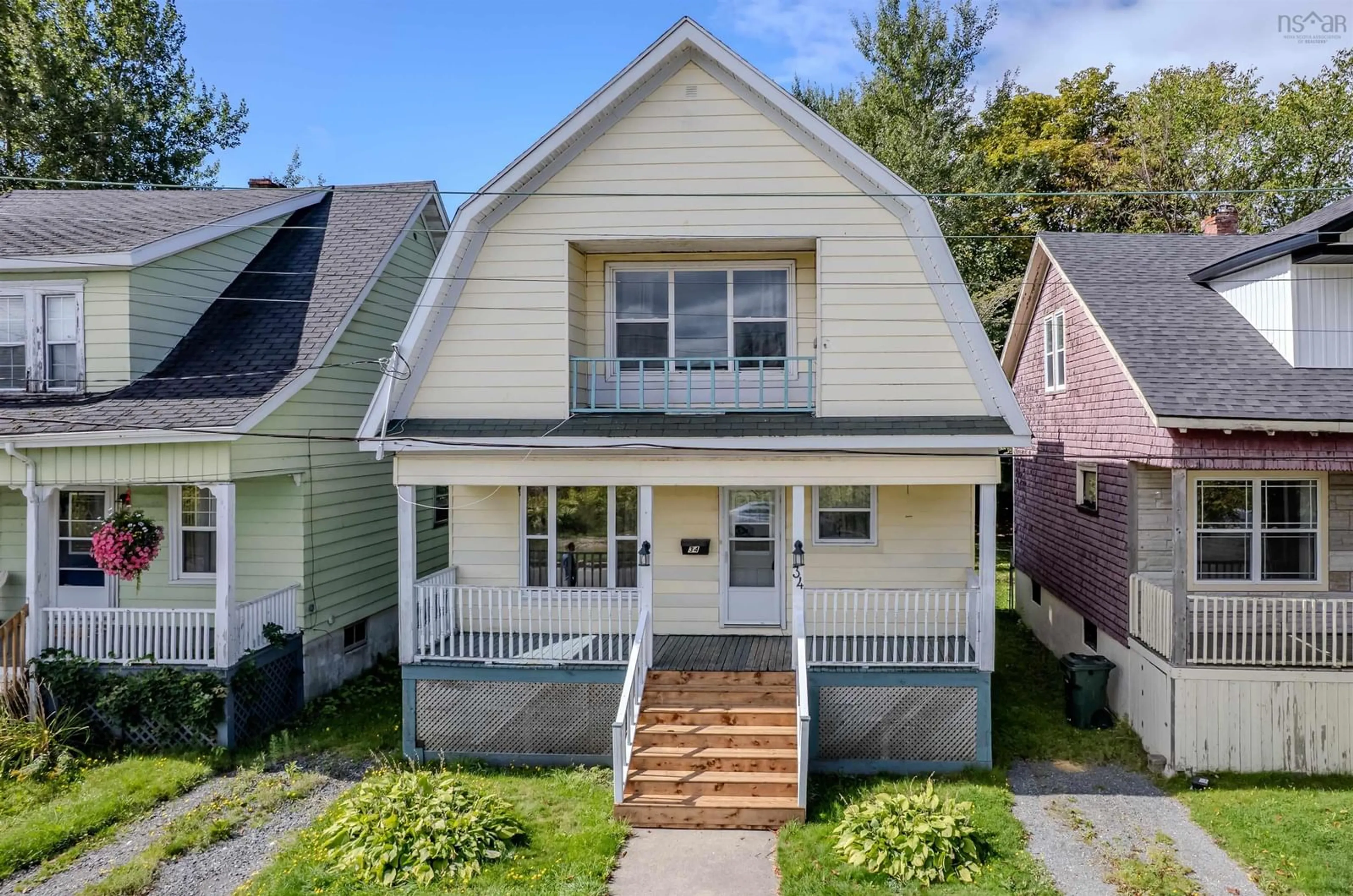 Home with vinyl exterior material, street for 34 Hugh St, Sydney Nova Scotia B1P 1V7