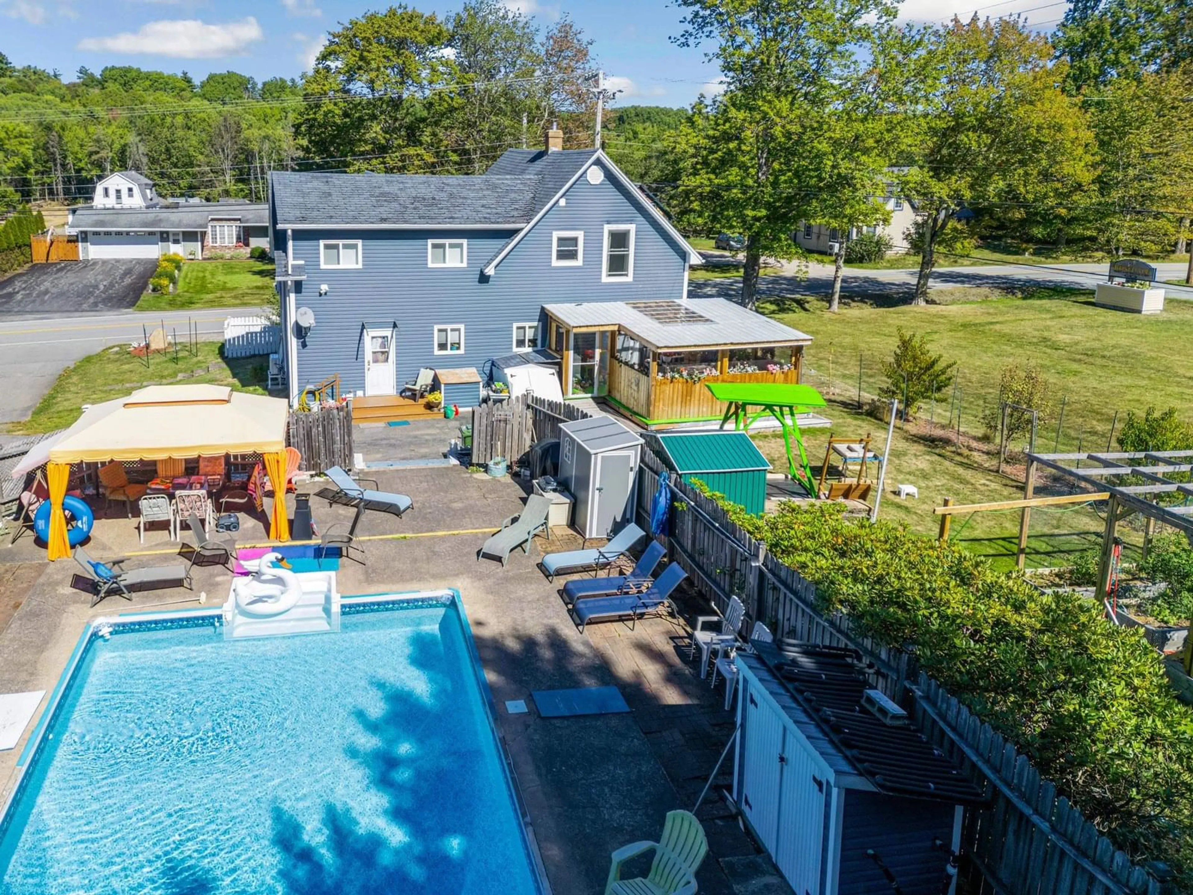 A pic from outside/outdoor area/front of a property/back of a property/a pic from drone, water/lake/river/ocean view for 4935 & 4935 Unit B Highway 10, New Germany Nova Scotia B0R 1E0