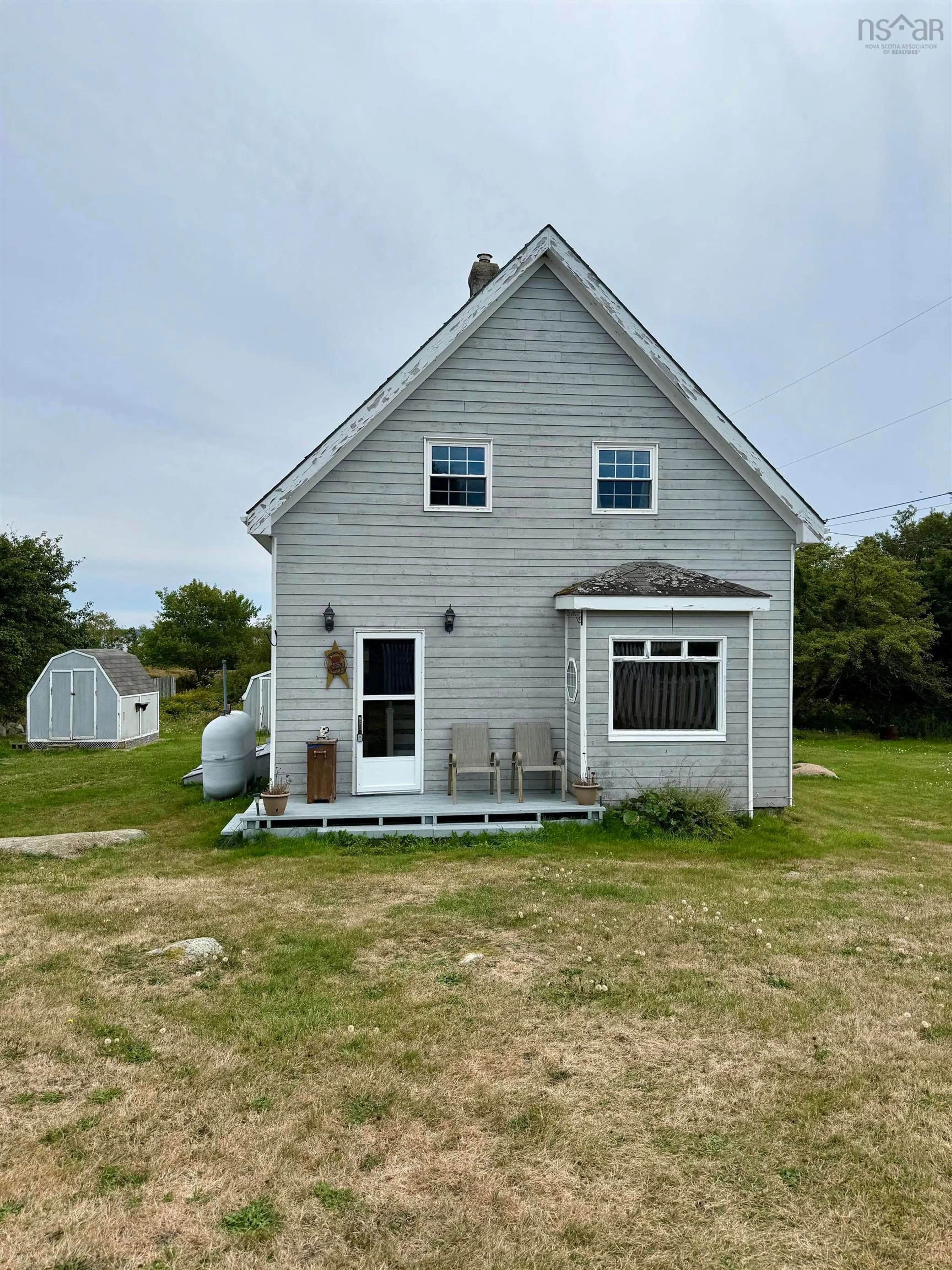 A pic from outside/outdoor area/front of a property/back of a property/a pic from drone, building for 1716 Sandy Point Rd, Sandy Point Nova Scotia B0T 1W0