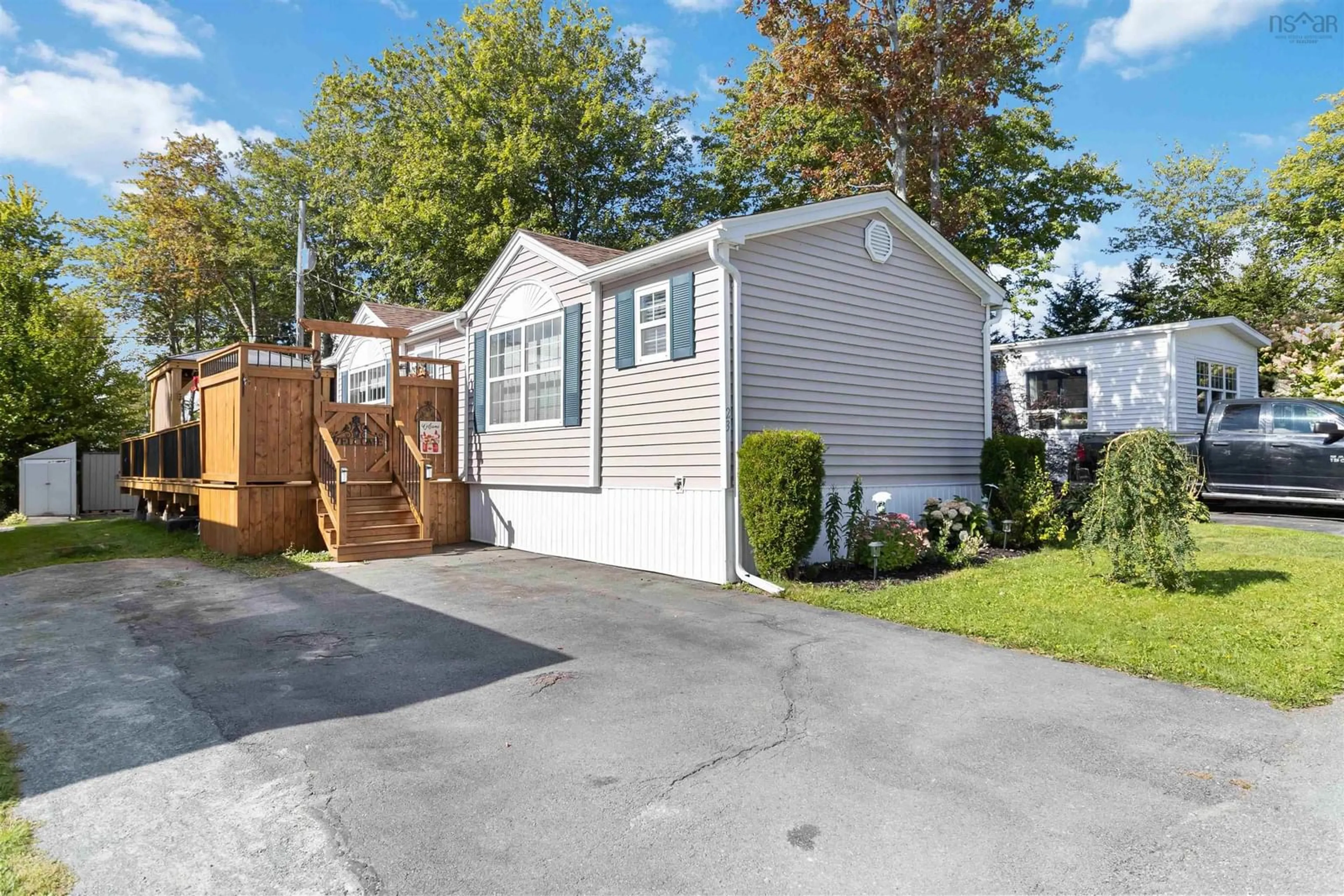 Home with vinyl exterior material, street for 23 Third St, Lucasville Nova Scotia B4B 1R1