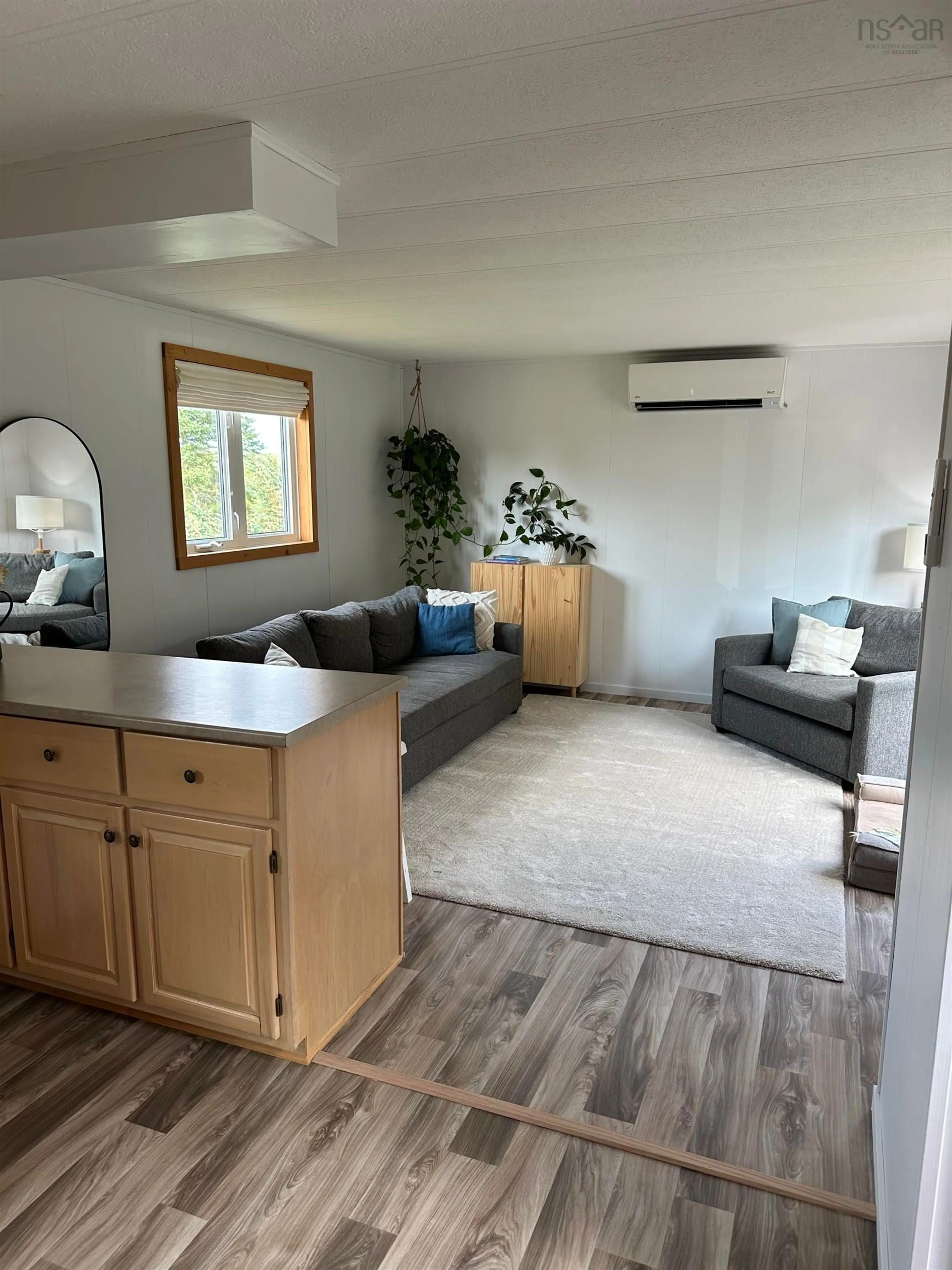 Living room with furniture, wood/laminate floor for 1341 Laggan Road, Laggan Nova Scotia B0K 1A0