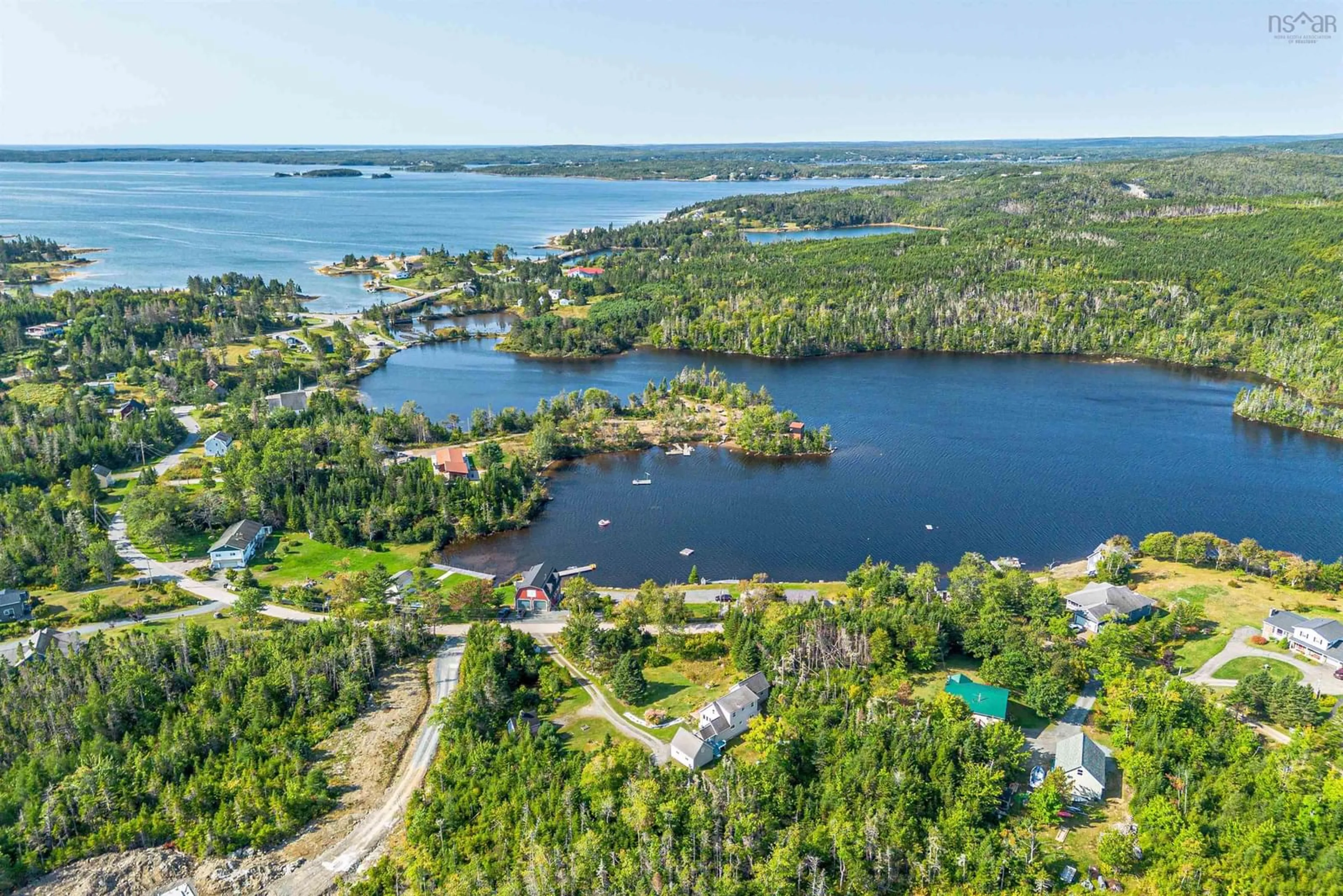 A pic from outside/outdoor area/front of a property/back of a property/a pic from drone, water/lake/river/ocean view for 72 Sunnyholme Rd, Oyster Pond Nova Scotia B0J 1W0