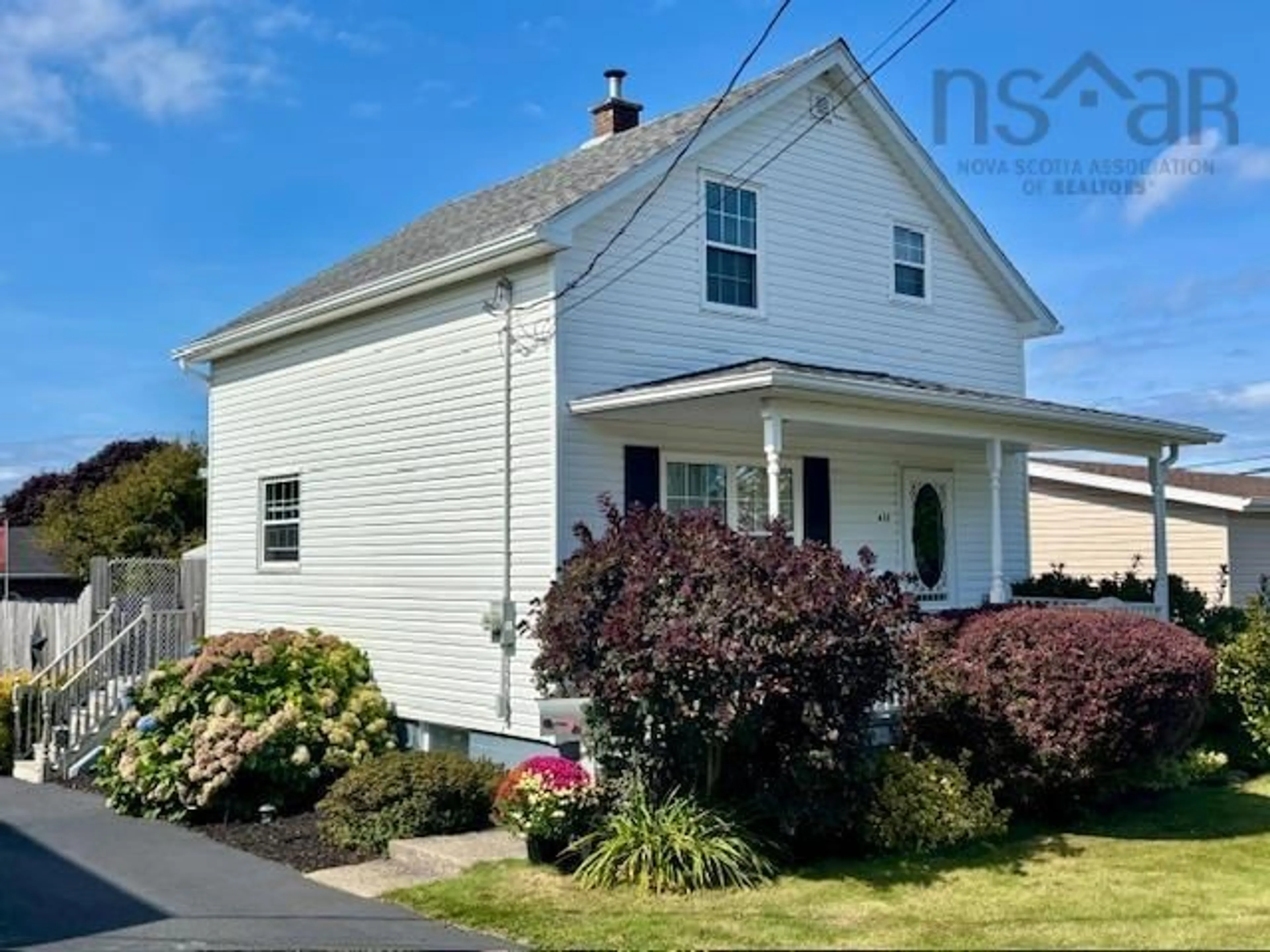 Home with vinyl exterior material, street for 613 Acadia St, New Waterford Nova Scotia B1H 4A8