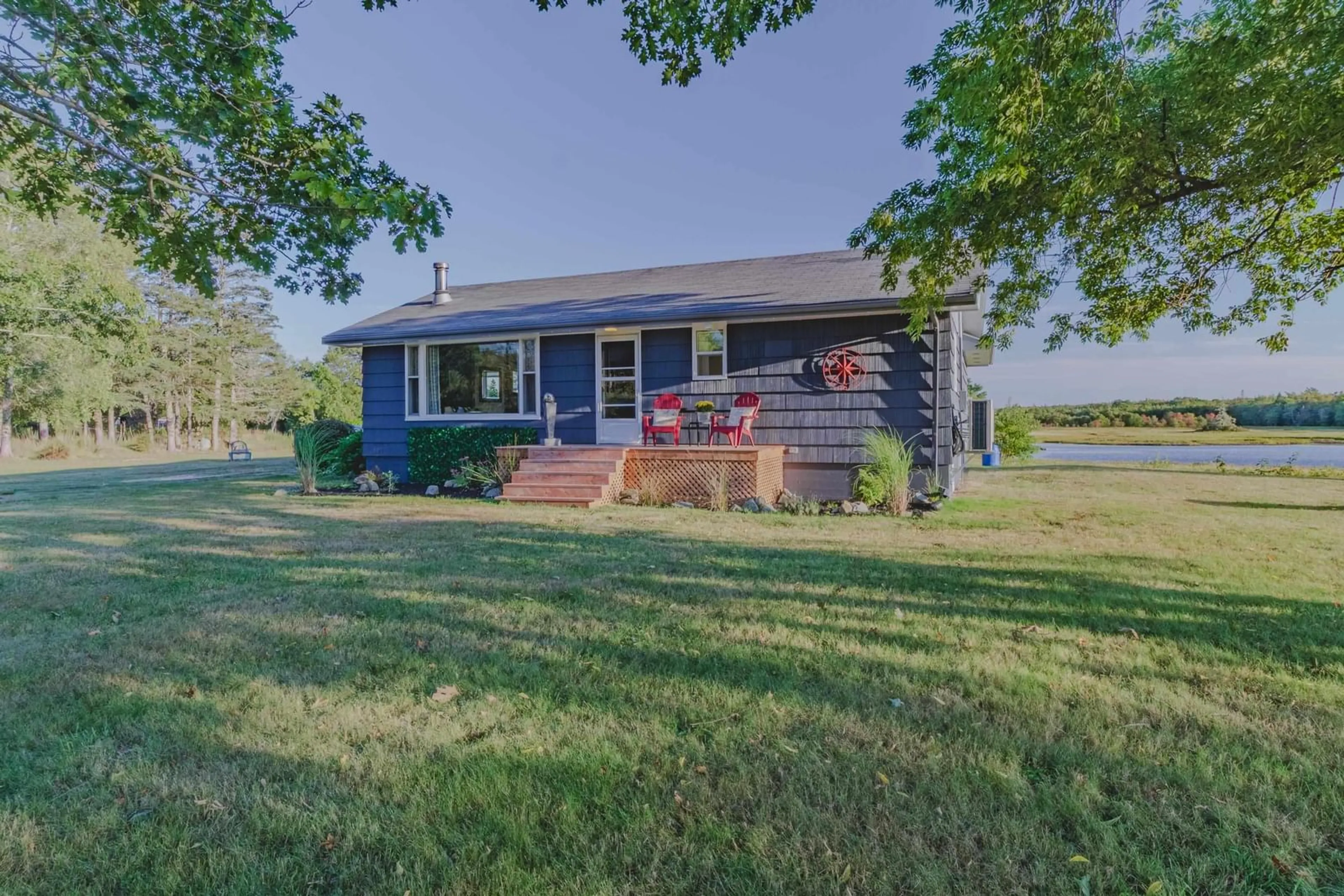 A pic from outside/outdoor area/front of a property/back of a property/a pic from drone, water/lake/river/ocean view for 7192 Highway 308, Quinan Nova Scotia B0W 1M0