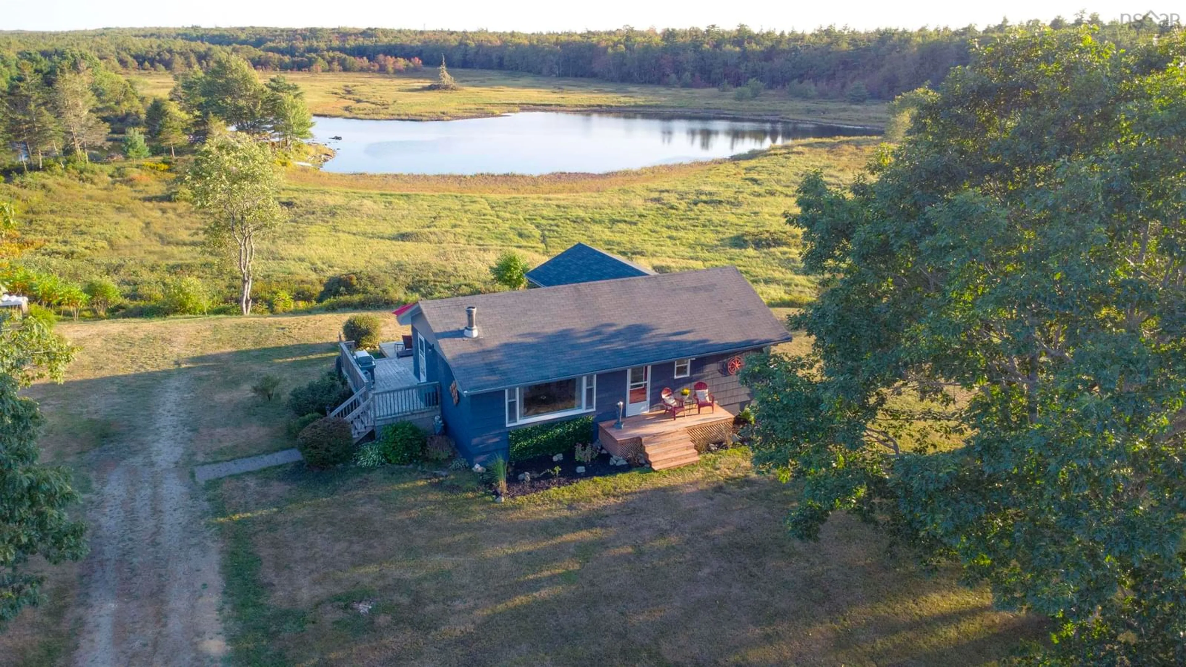 A pic from outside/outdoor area/front of a property/back of a property/a pic from drone, water/lake/river/ocean view for 7192 Highway 308, Quinan Nova Scotia B0W 1M0