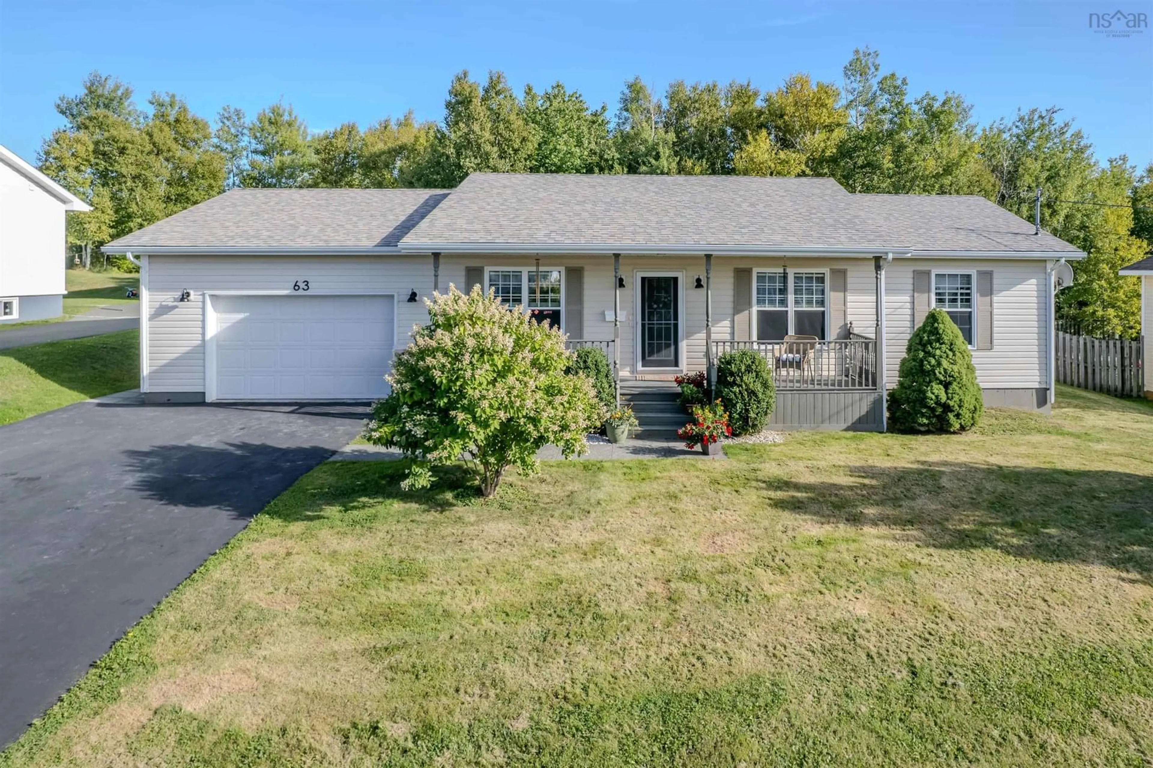 Home with vinyl exterior material, street for 63 Mae Ave, Sydney Mines Nova Scotia B1V 3K8