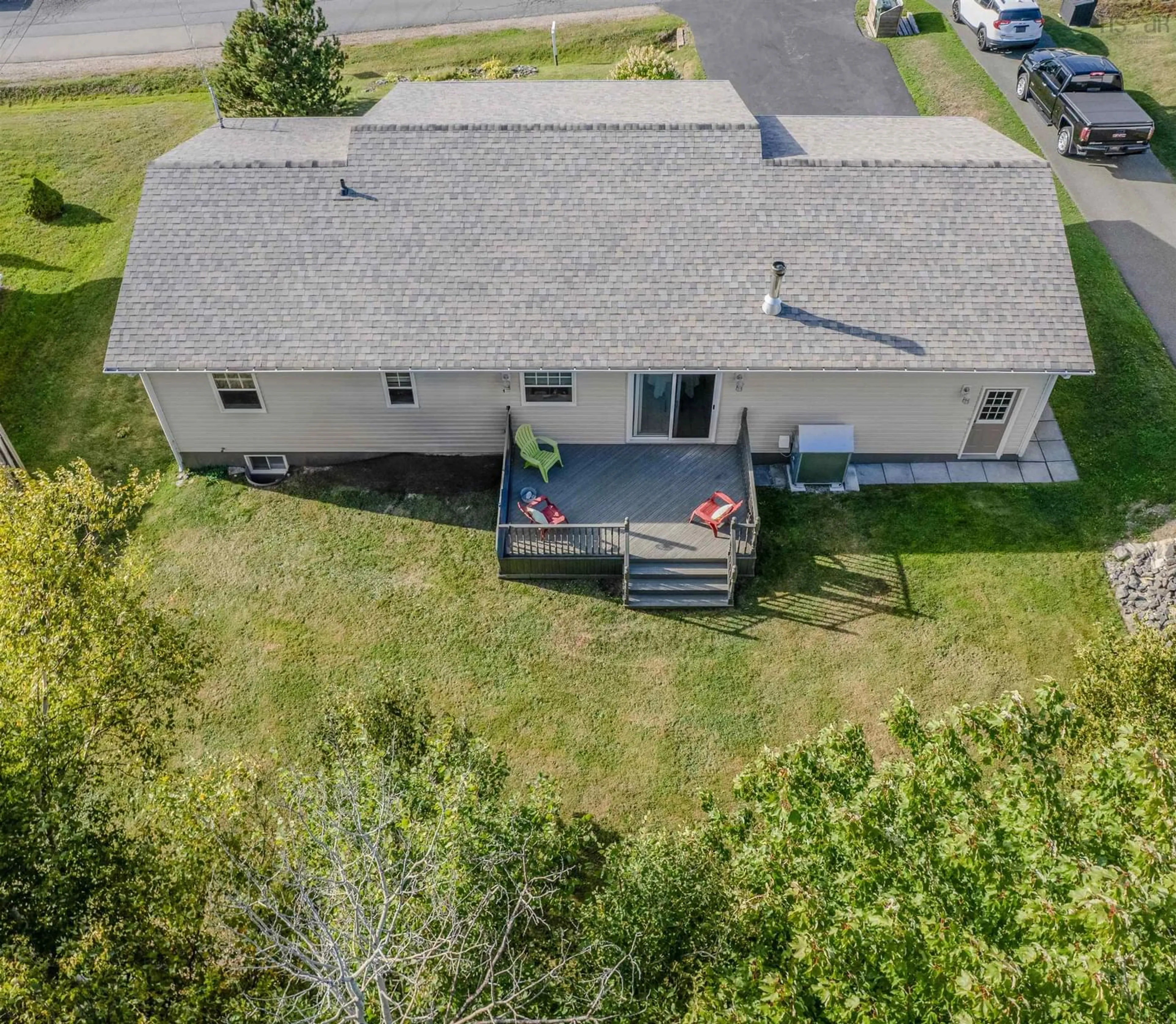 A pic from outside/outdoor area/front of a property/back of a property/a pic from drone, unknown for 63 Mae Ave, Sydney Mines Nova Scotia B1V 3K8