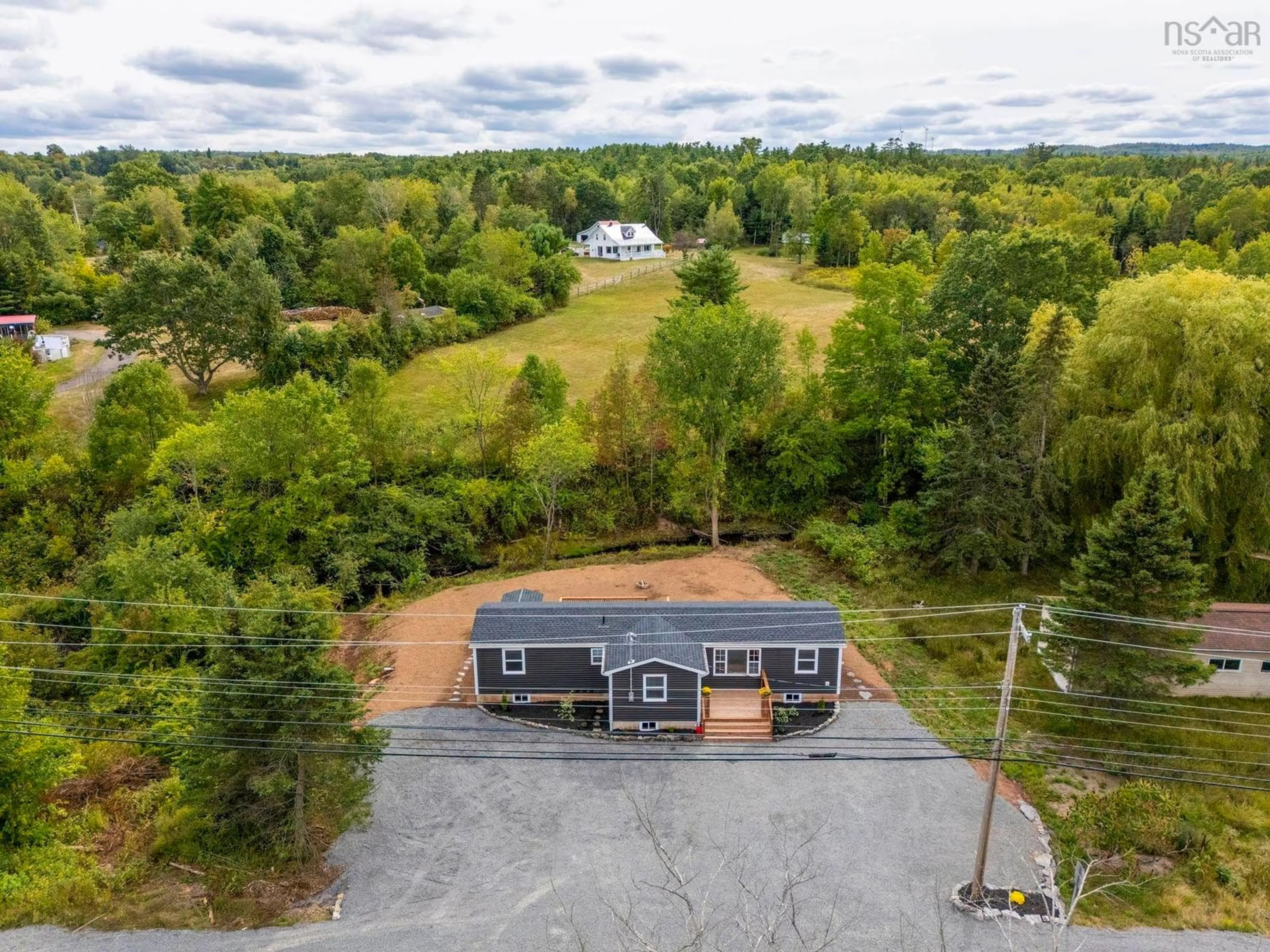 A pic from outside/outdoor area/front of a property/back of a property/a pic from drone, unknown for 4668 Highway 1, Three Mile Plains Nova Scotia B0N 2T0
