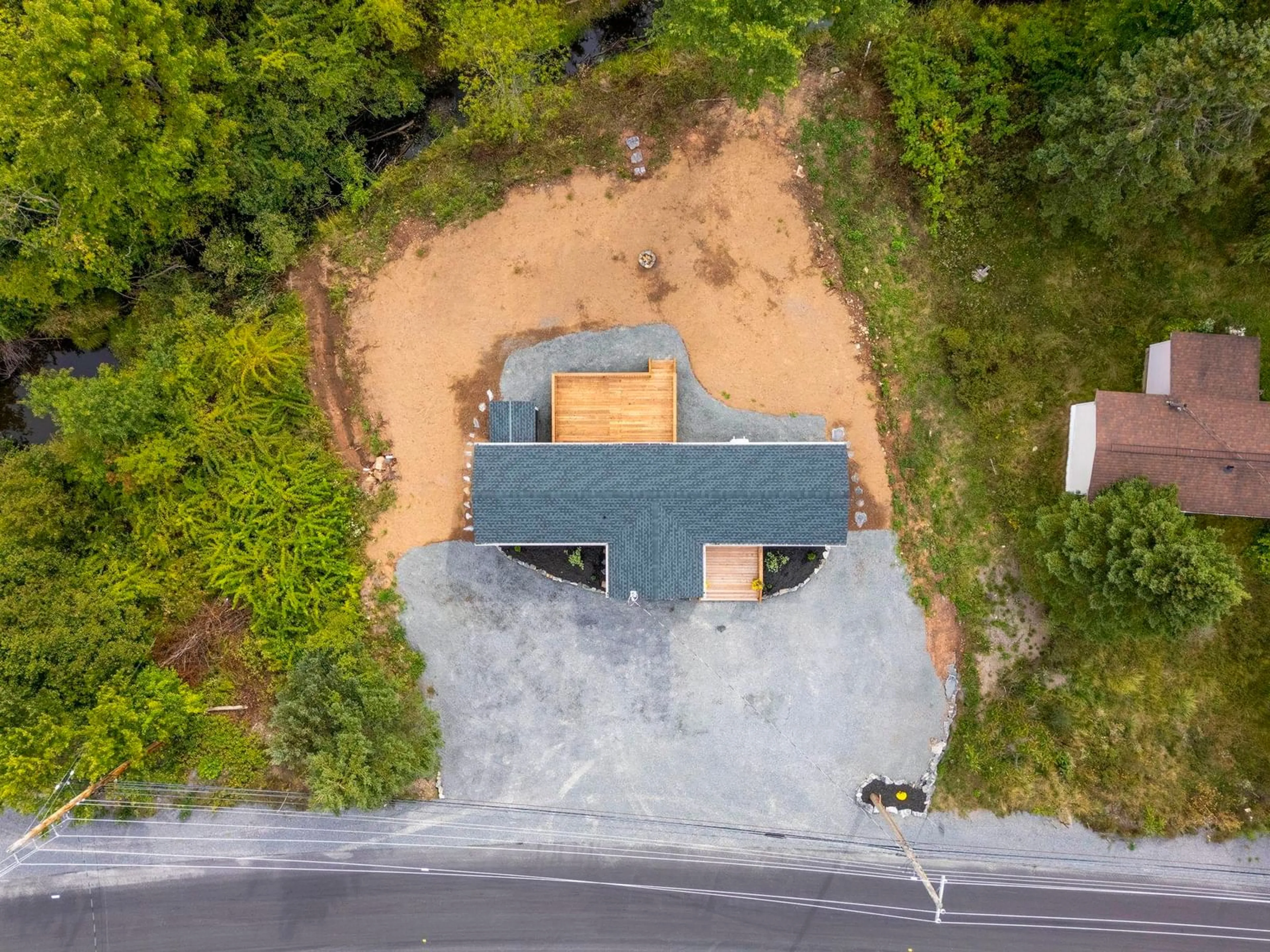 A pic from outside/outdoor area/front of a property/back of a property/a pic from drone, street for 4668 Highway 1, Three Mile Plains Nova Scotia B0N 2T0