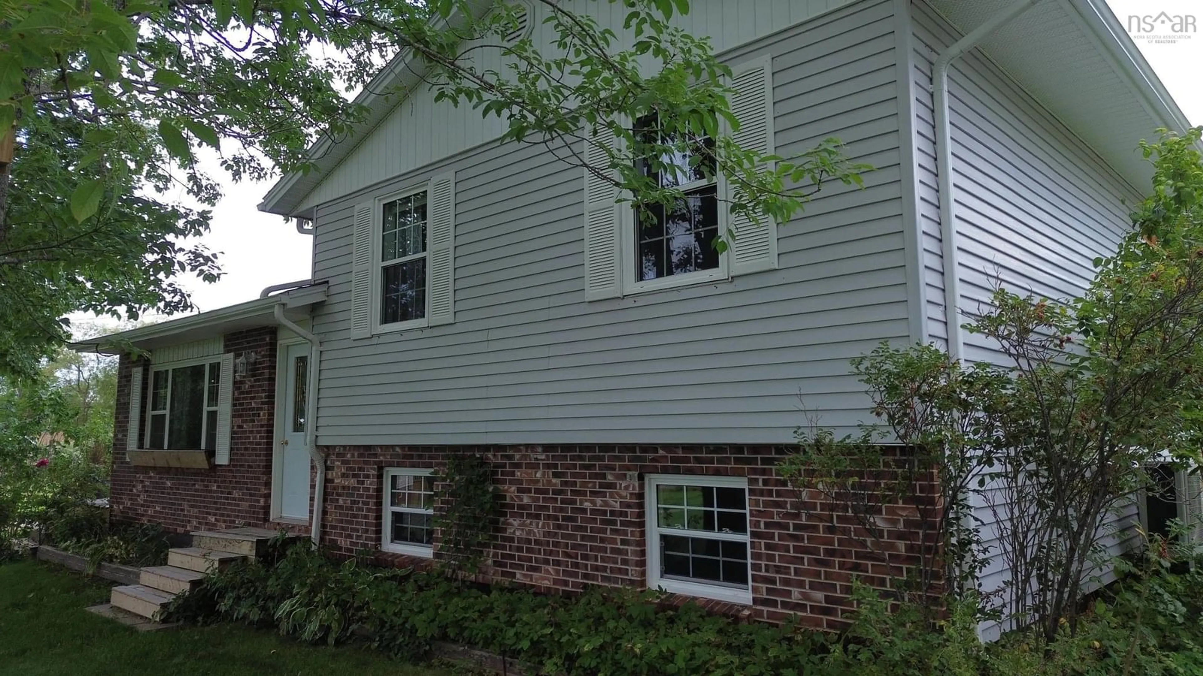 Home with vinyl exterior material, street for 26 Cameron Hill Lane, Mabou Nova Scotia B0E 1X0