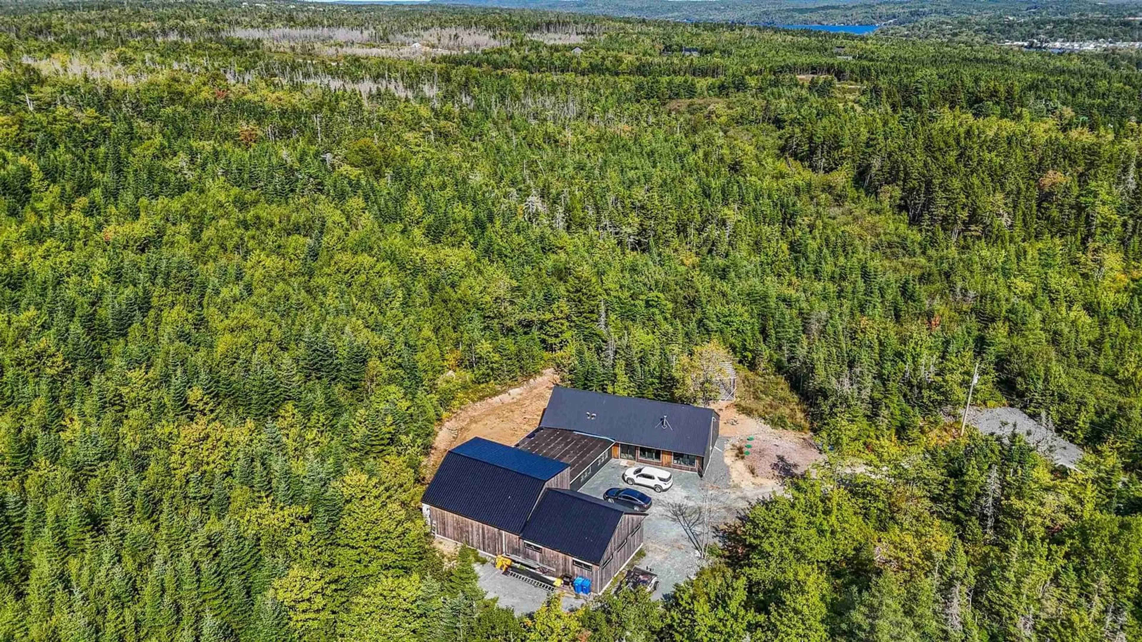 A pic from outside/outdoor area/front of a property/back of a property/a pic from drone, forest/trees view for 381 West Porters Lake Rd, West Porters Lake Nova Scotia B3E 1K5