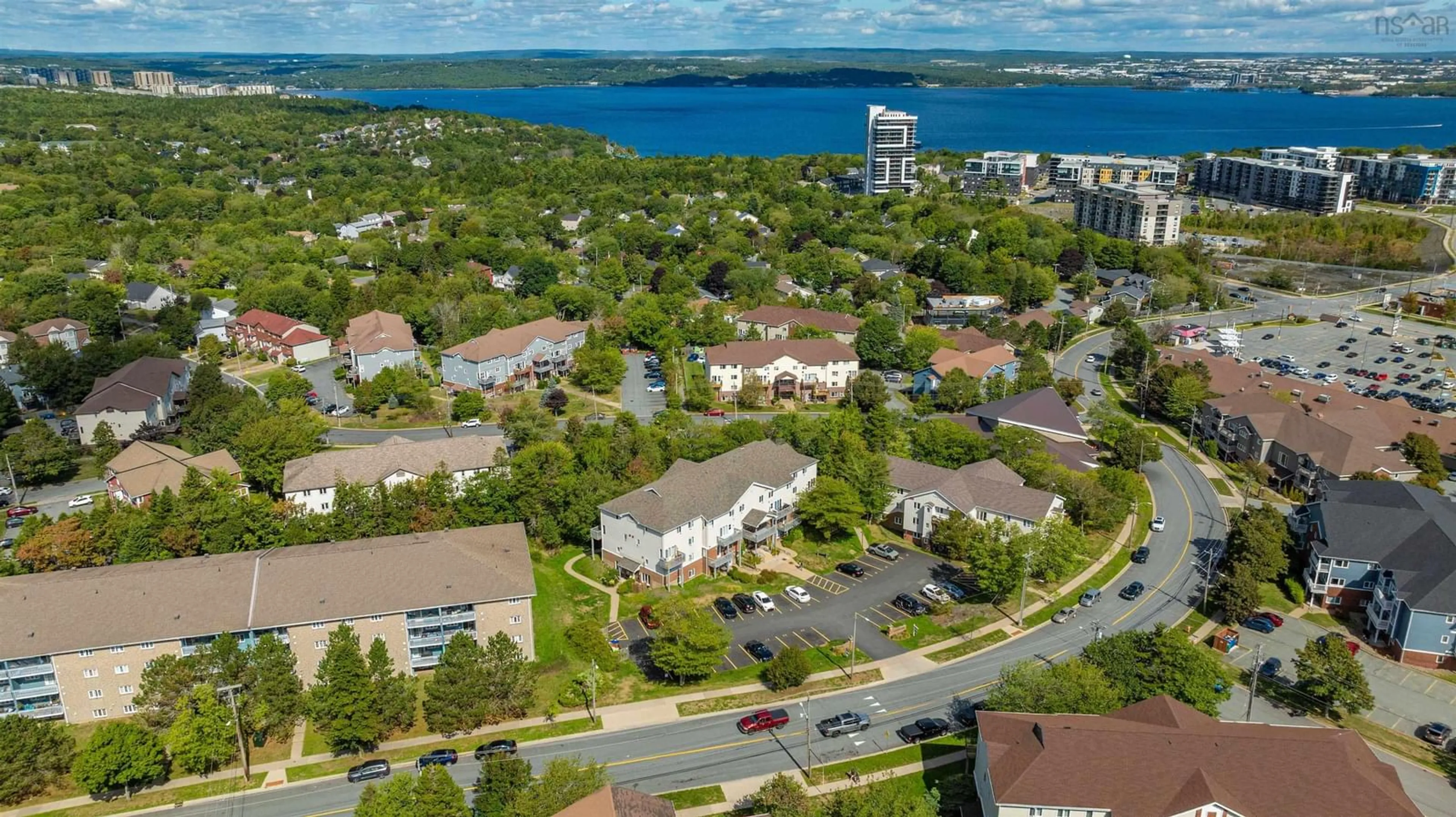 A pic from outside/outdoor area/front of a property/back of a property/a pic from drone, water/lake/river/ocean view for 159 Farnham Gate Rd #104, Halifax Nova Scotia B3M 4A3