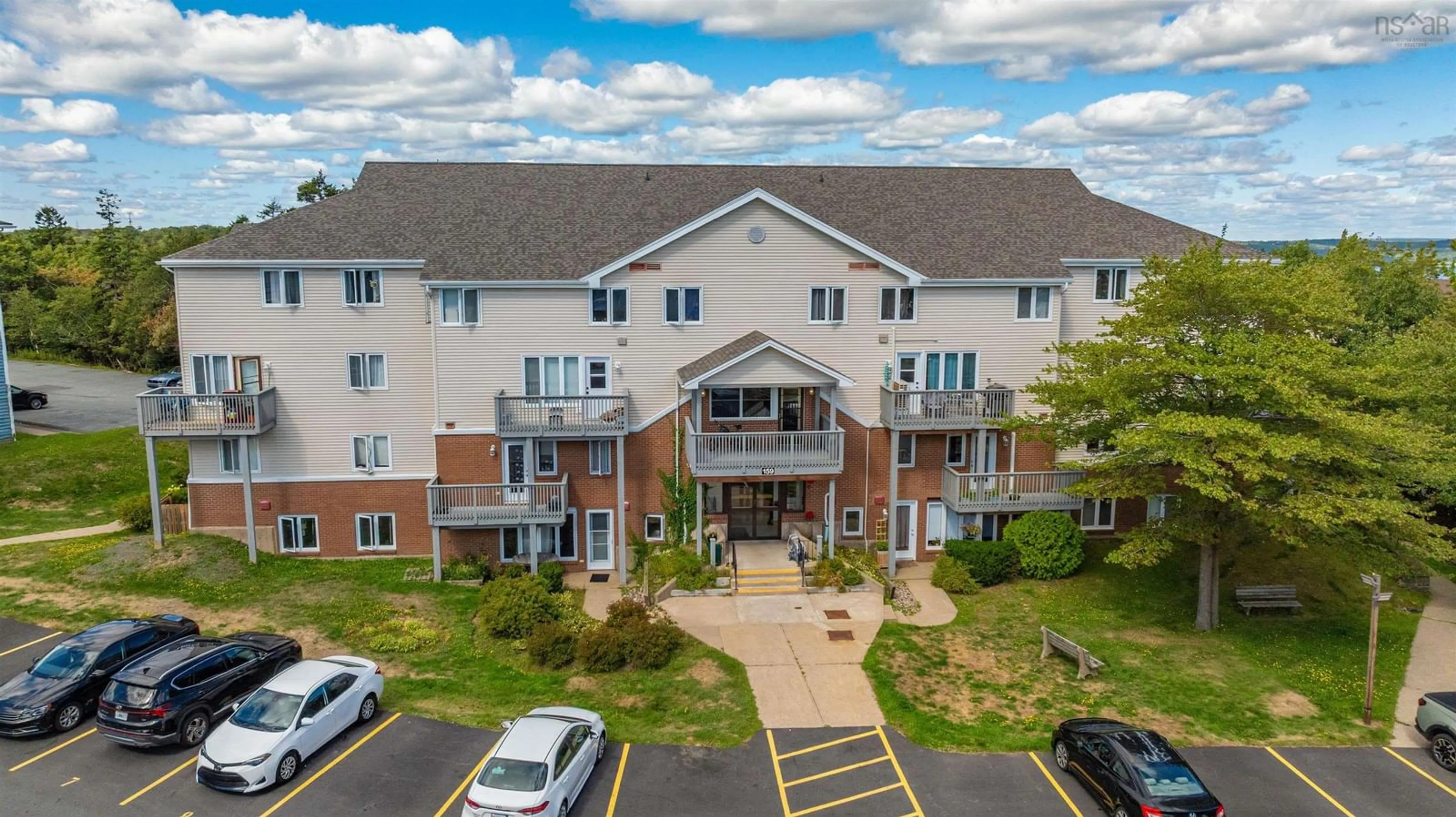 A pic from outside/outdoor area/front of a property/back of a property/a pic from drone, unknown for 159 Farnham Gate Rd #104, Halifax Nova Scotia B3M 4A3