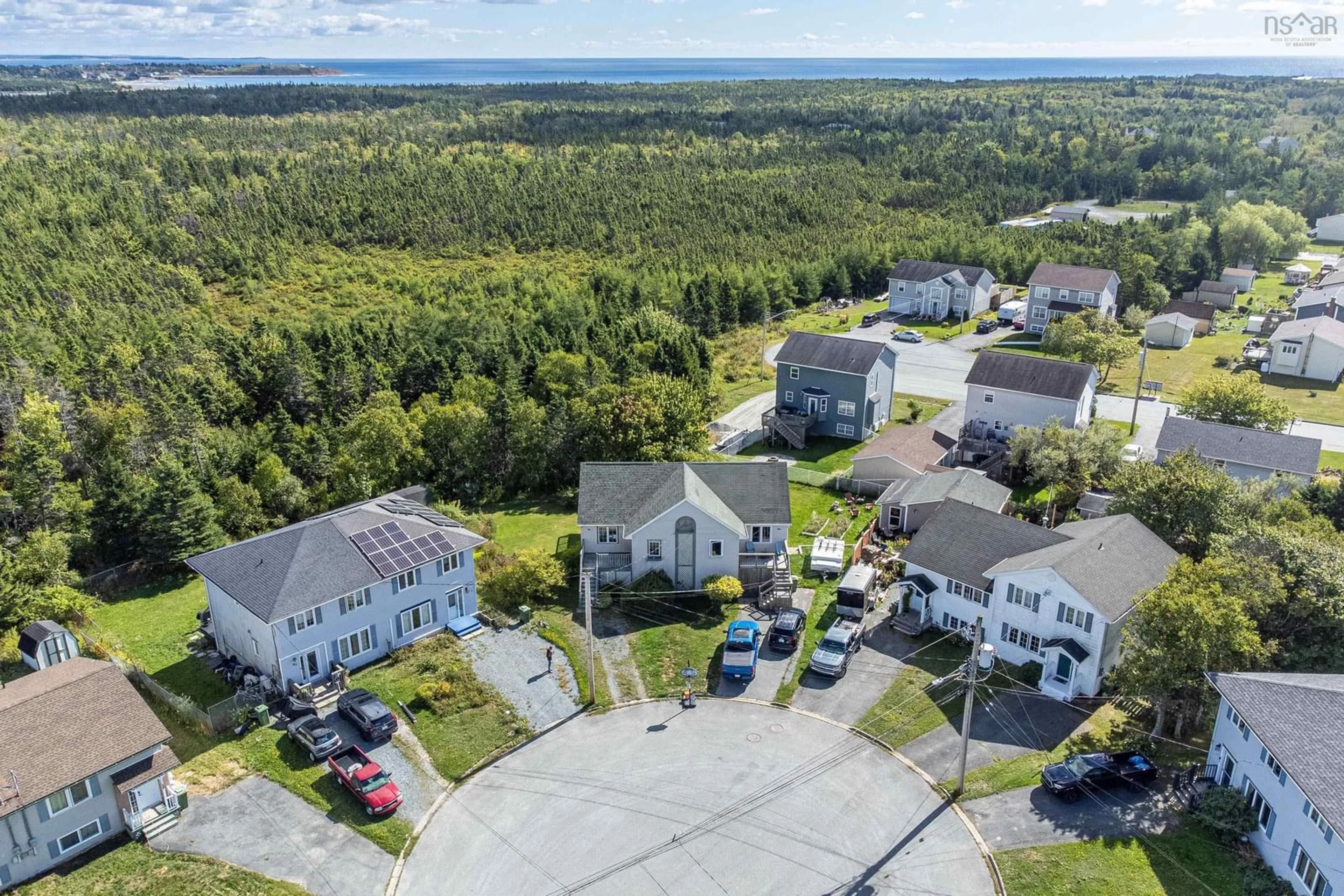 A pic from outside/outdoor area/front of a property/back of a property/a pic from drone, street for 64 Thorncrest Crt, Eastern Passage Nova Scotia B3G 1N4