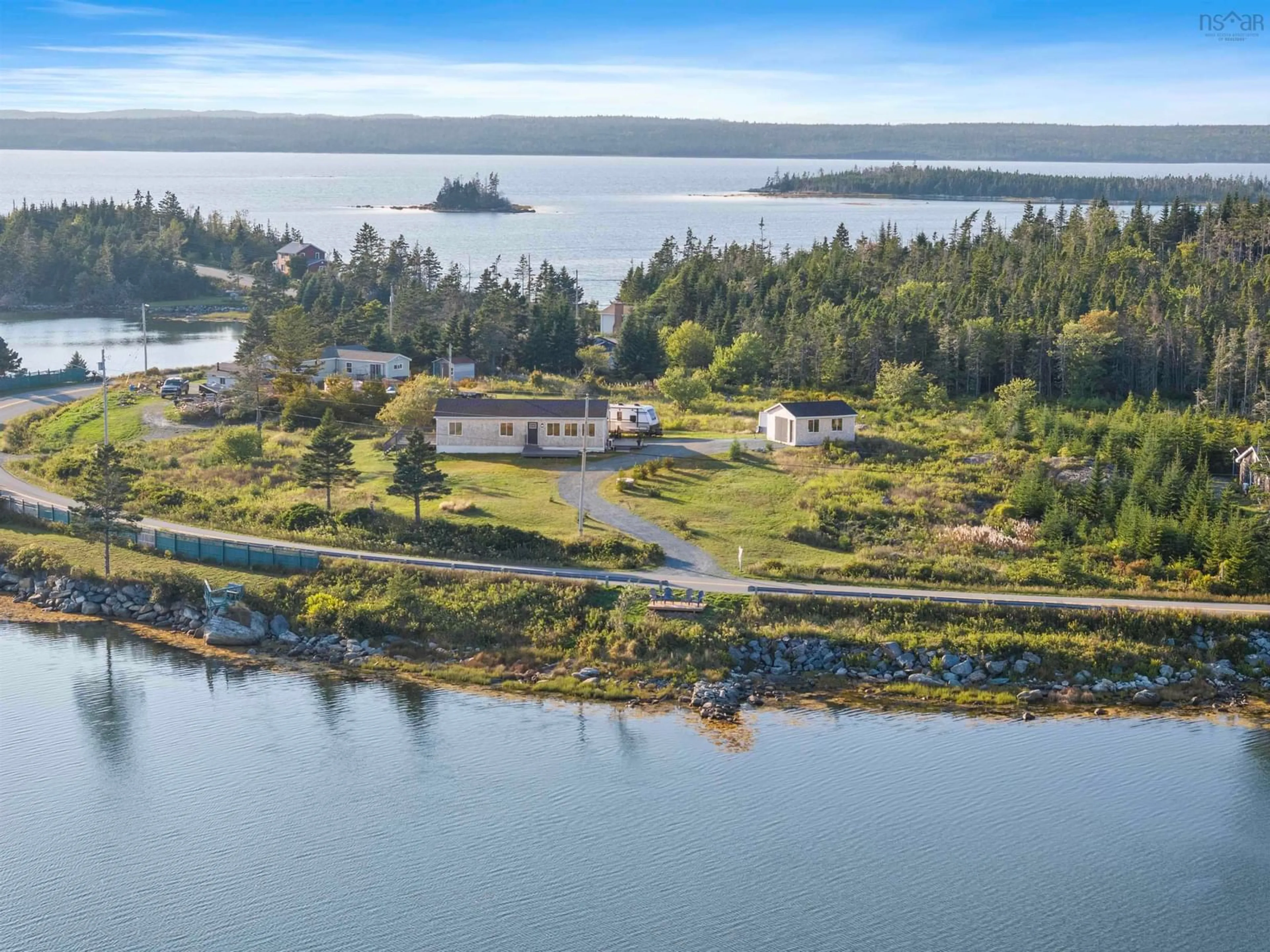 A pic from outside/outdoor area/front of a property/back of a property/a pic from drone, water/lake/river/ocean view for 1303 Passage Rd, Sheet Harbour Nova Scotia B0J 3B0
