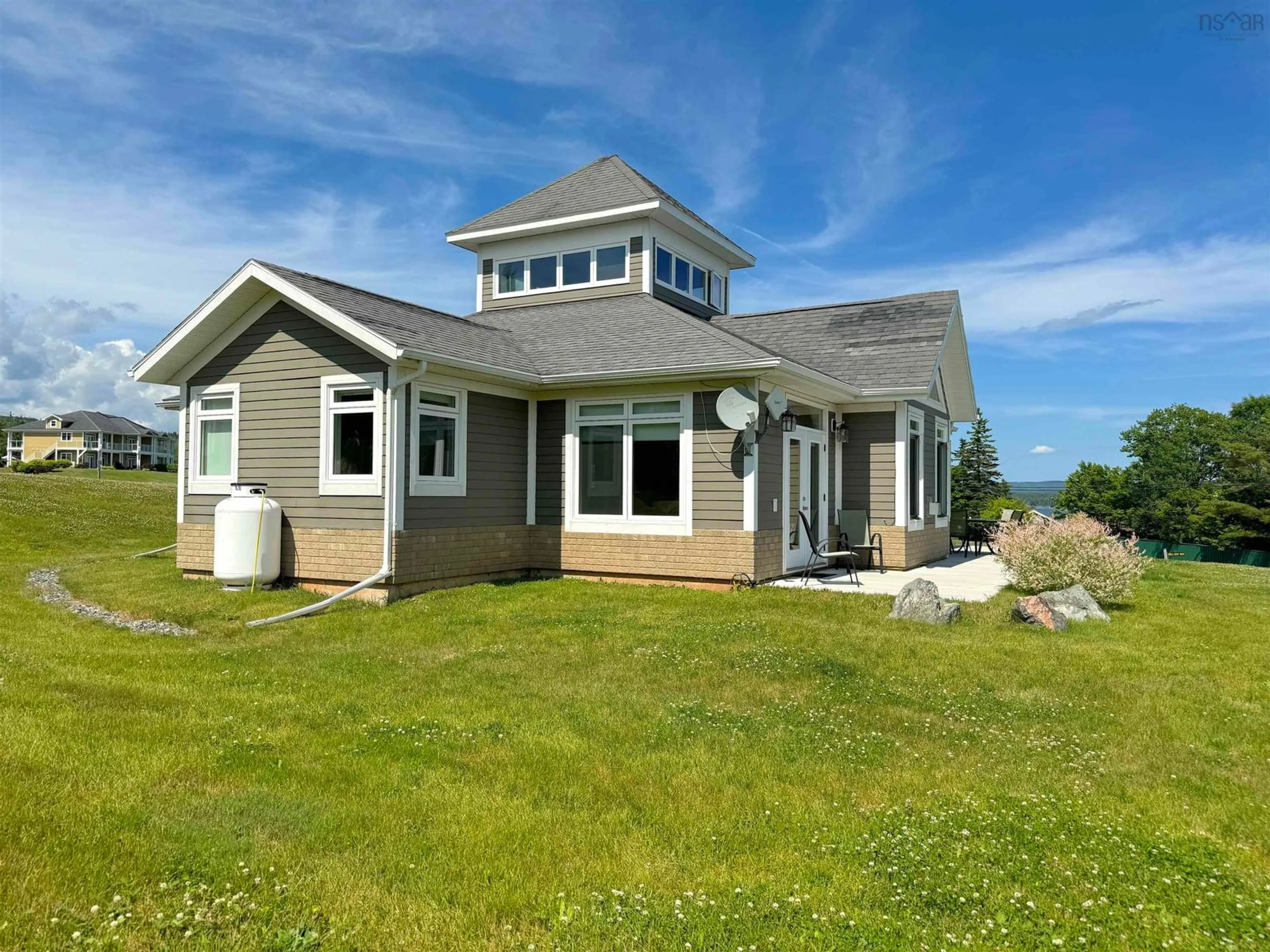 Home with vinyl exterior material, water/lake/river/ocean view for 7 Bell Bay Way, Baddeck Nova Scotia B0C 1H0
