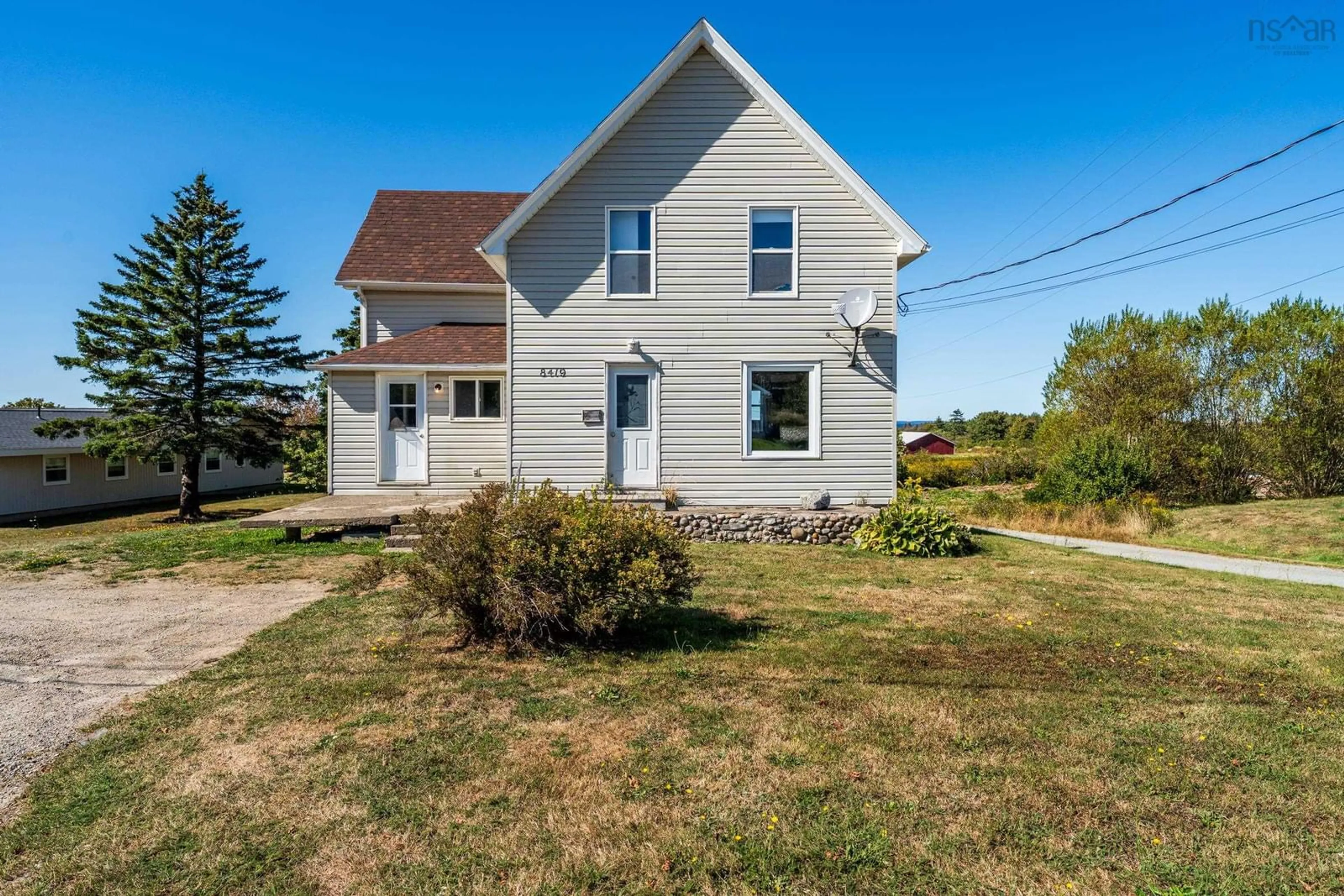 Home with vinyl exterior material, street for 8419 Highway 1, Meteghan Nova Scotia B0W 2L0