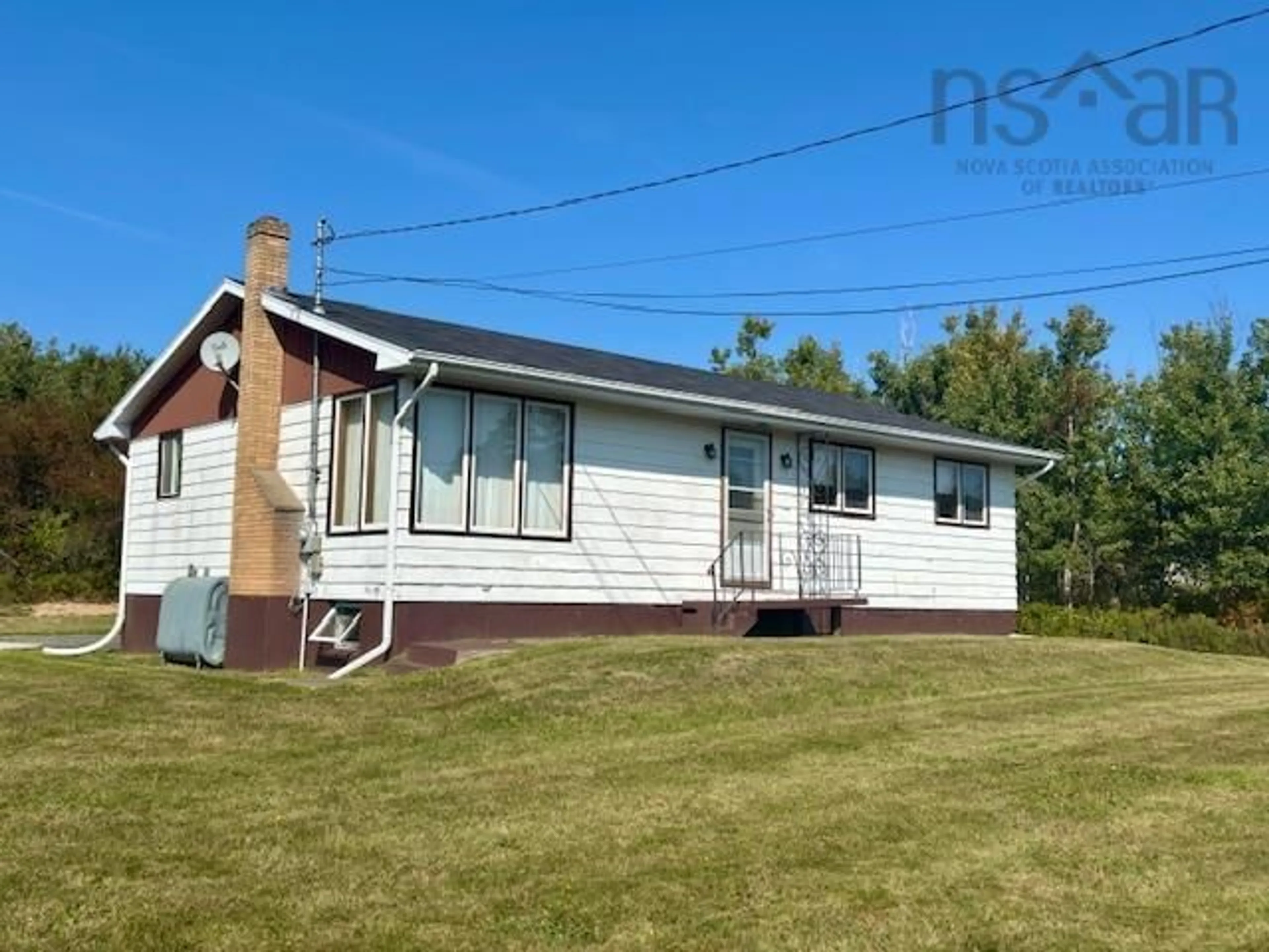 A pic from outside/outdoor area/front of a property/back of a property/a pic from drone, building for 2695 Lingan Rd, Lingan Nova Scotia B1H 5E7