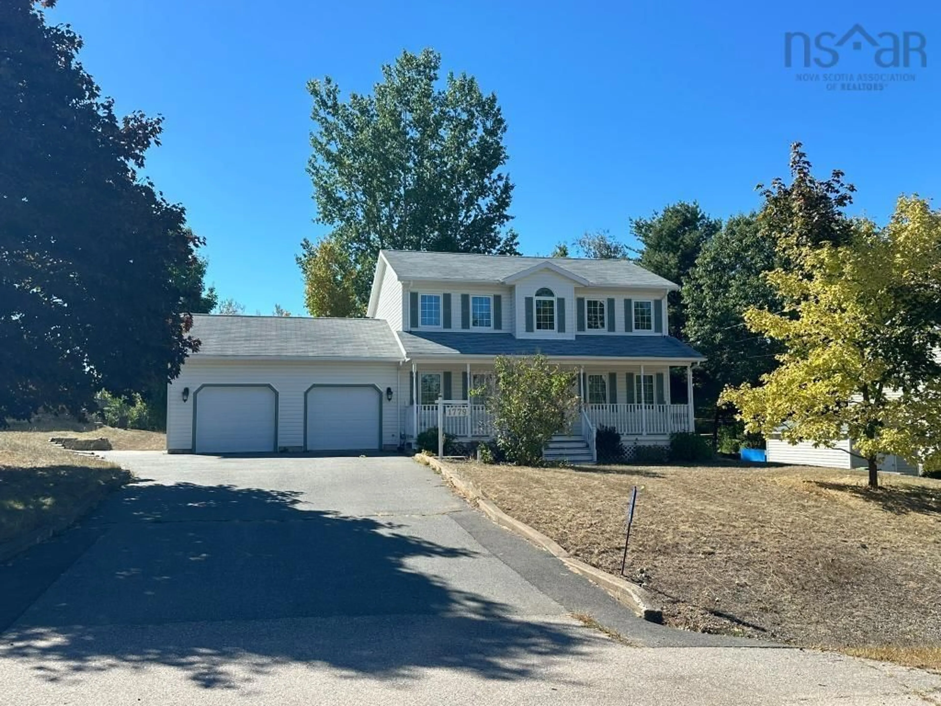 Home with vinyl exterior material, street for 1779 Drummond Dr, Kingston Nova Scotia B0P 1R0