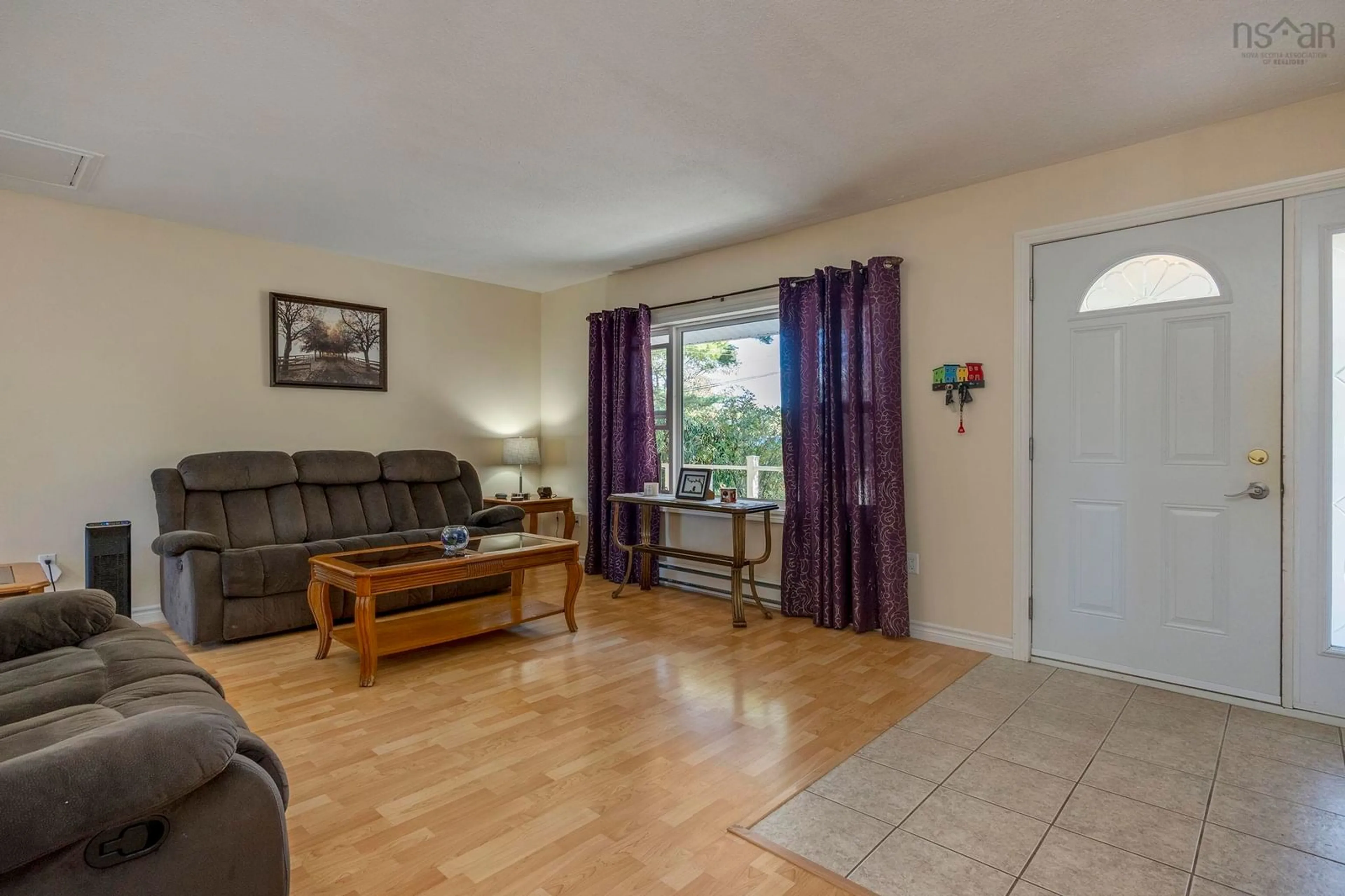 Living room with furniture, wood/laminate floor for 1073 Whittington Dr, Greenwood Nova Scotia B0P 1R0