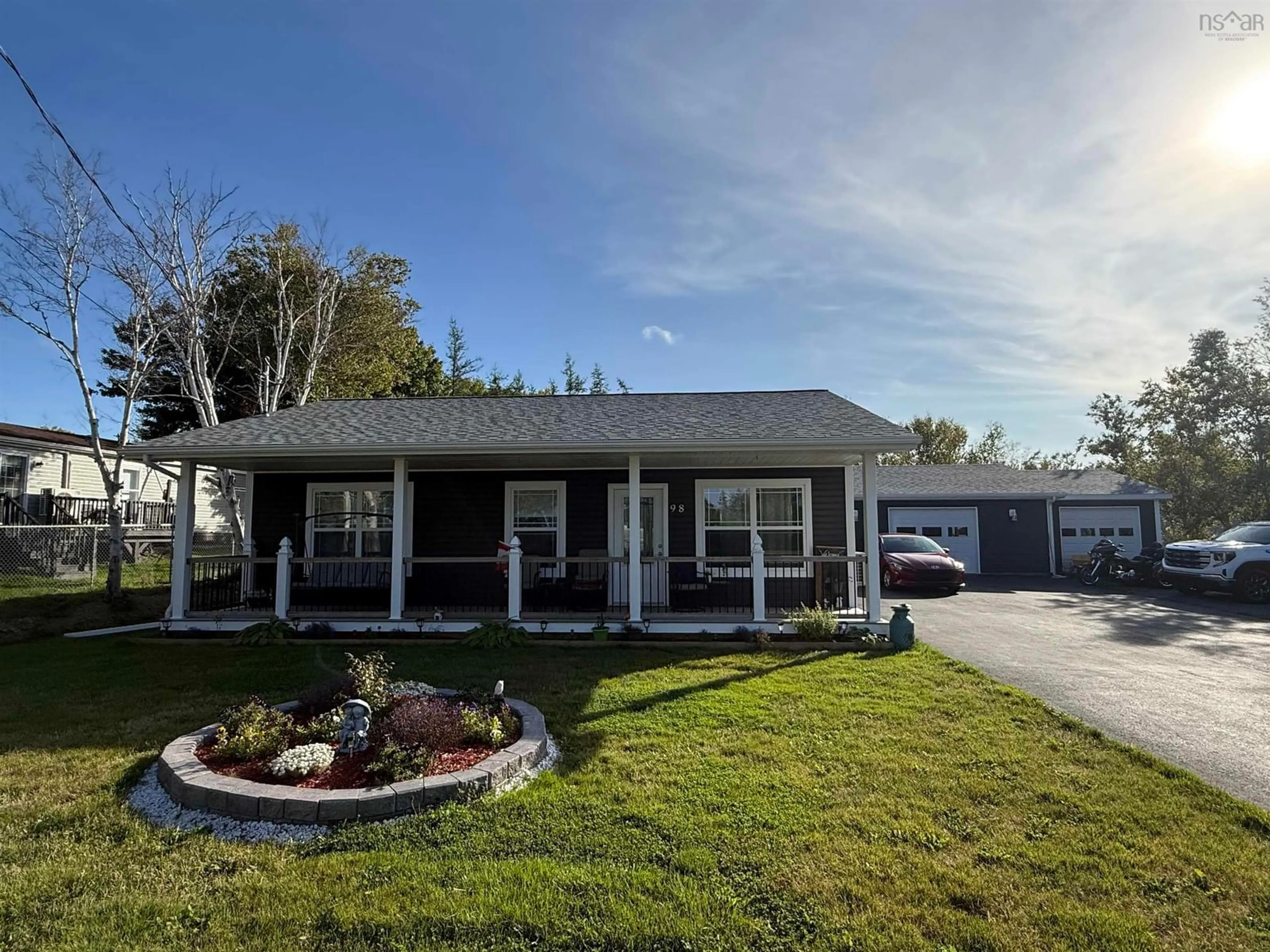 Home with vinyl exterior material, street for 98 Daley Rd, New Victoria Nova Scotia B1H 4Z8