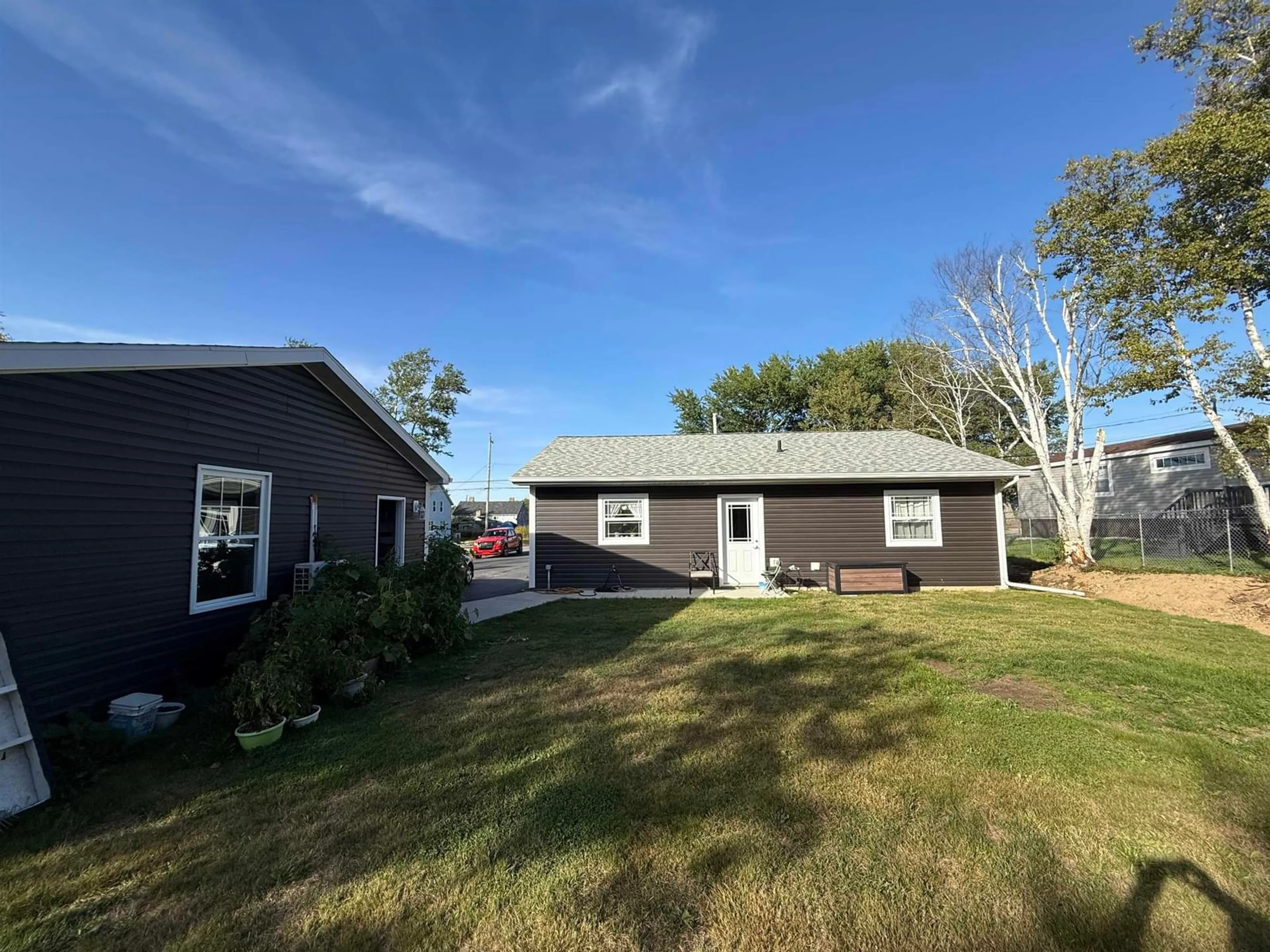 A pic from outside/outdoor area/front of a property/back of a property/a pic from drone, water/lake/river/ocean view for 98 Daley Rd, New Victoria Nova Scotia B1H 4Z8