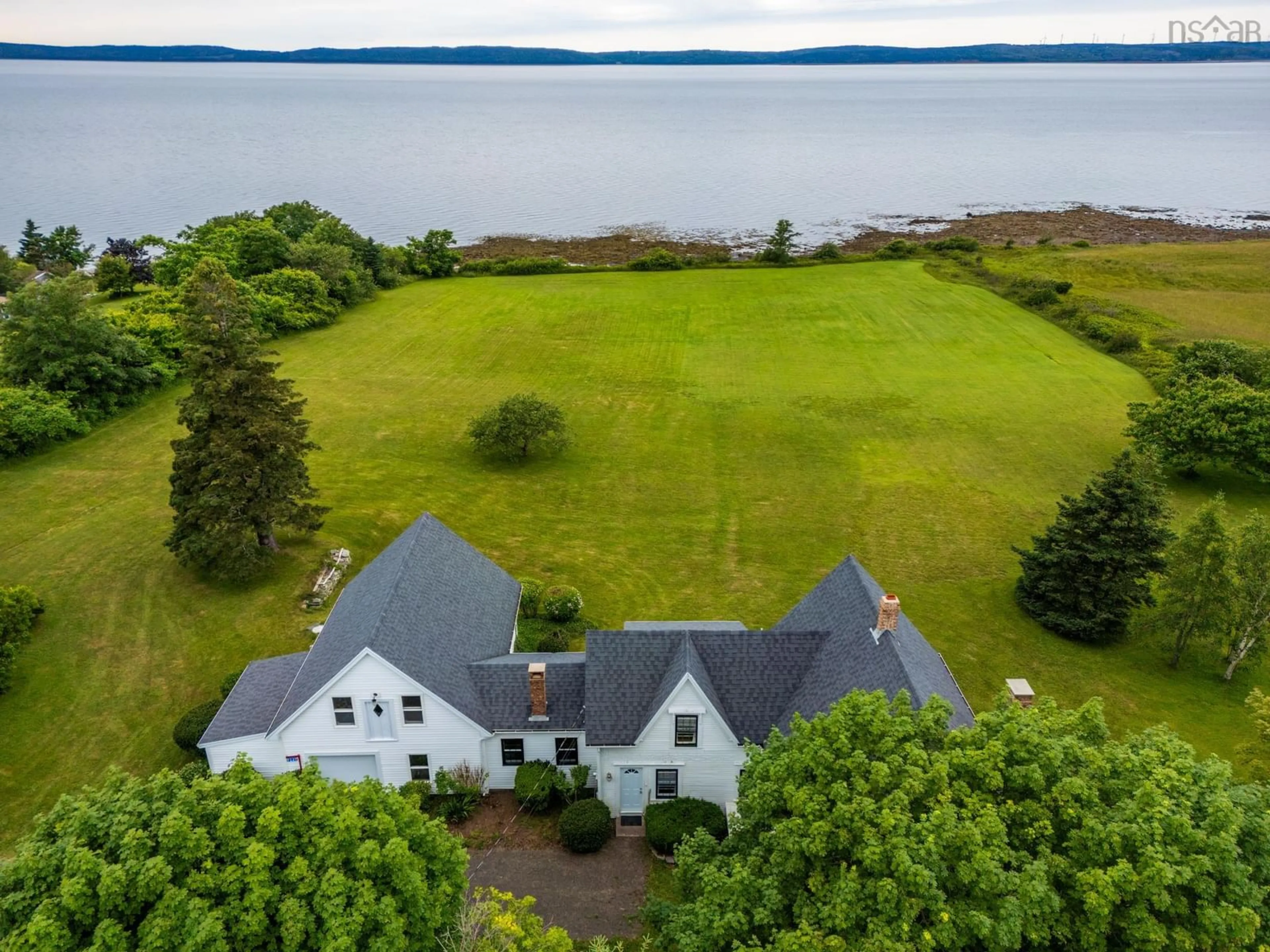 A pic from outside/outdoor area/front of a property/back of a property/a pic from drone, water/lake/river/ocean view for 7227 Highway 101, Plympton Nova Scotia B0W 2R0
