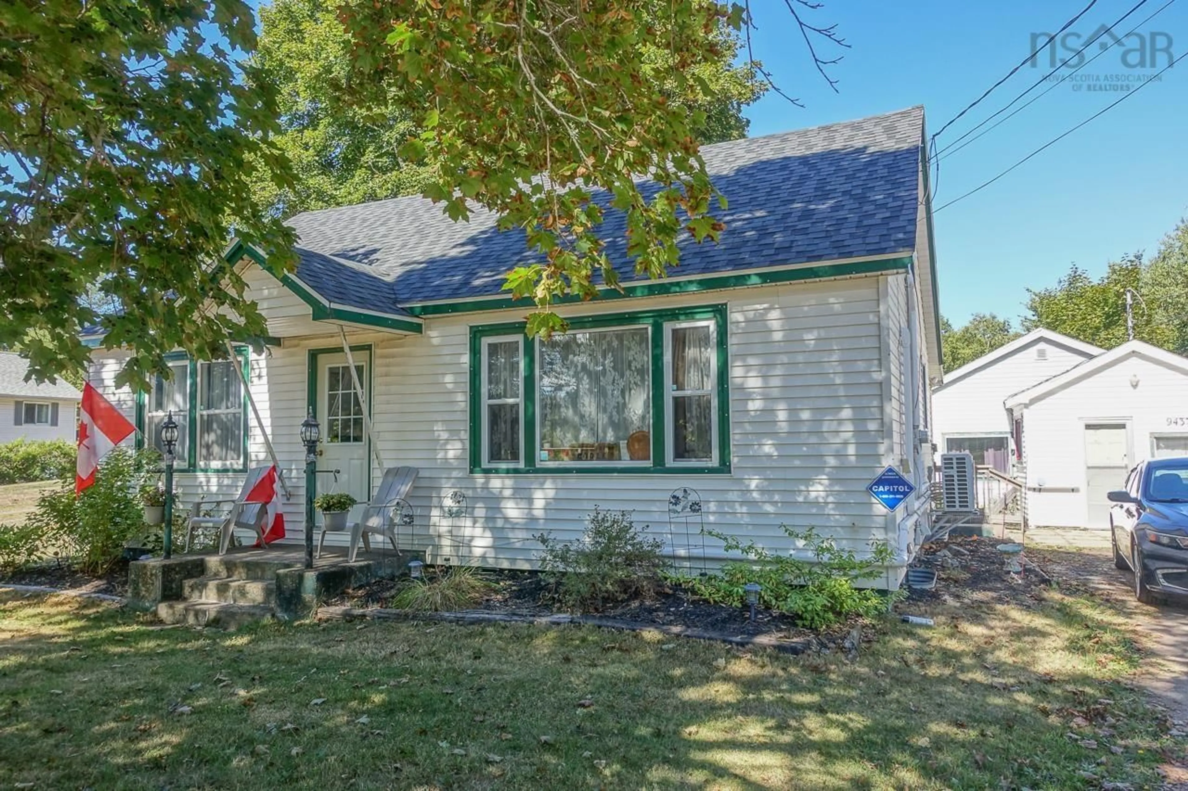 Home with vinyl exterior material, street for 9435 Commercial St, New Minas Nova Scotia B4N 3G3