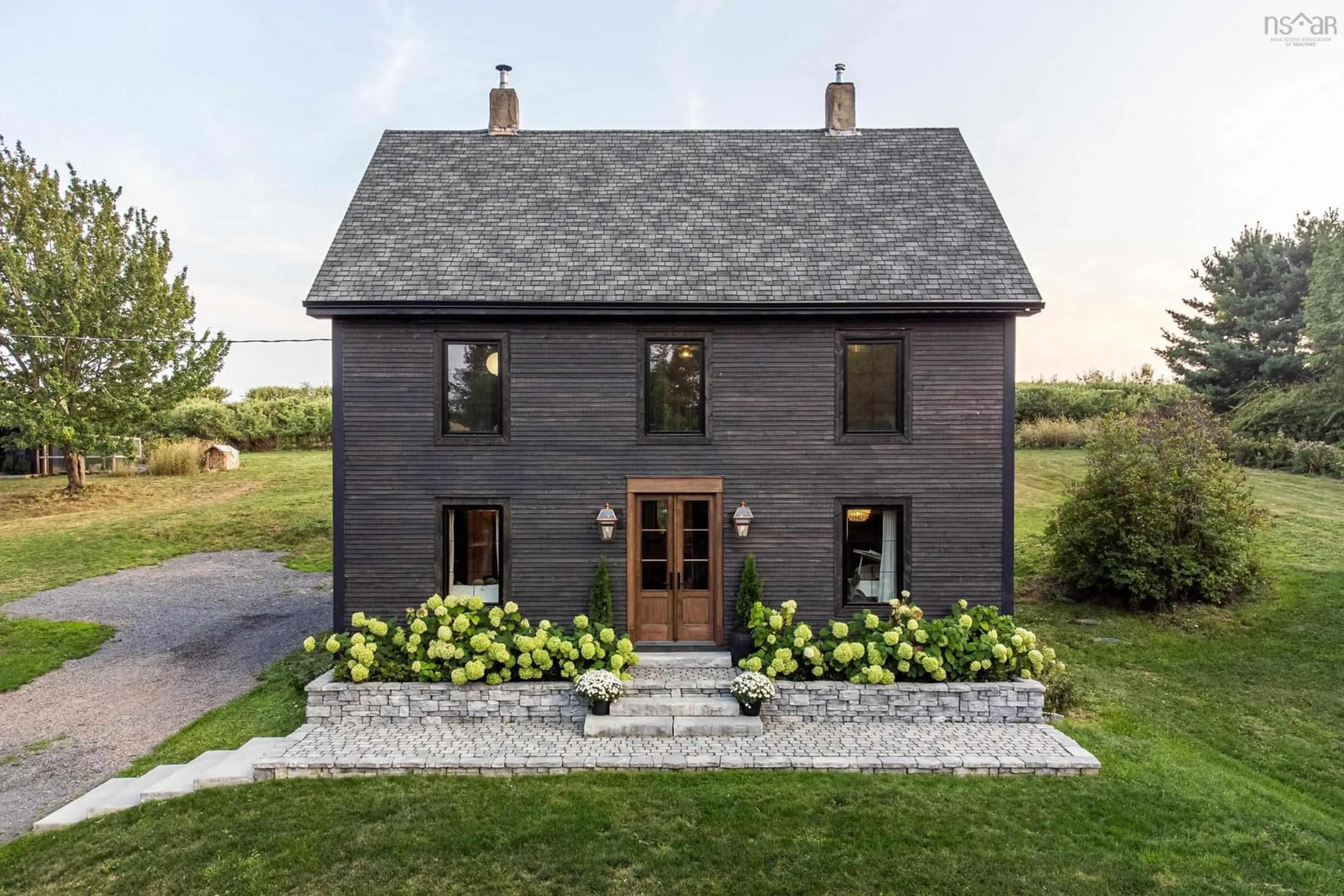 Home with brick exterior material, building for 11820 Highway 1, Grand Pré Nova Scotia B0P 1M0