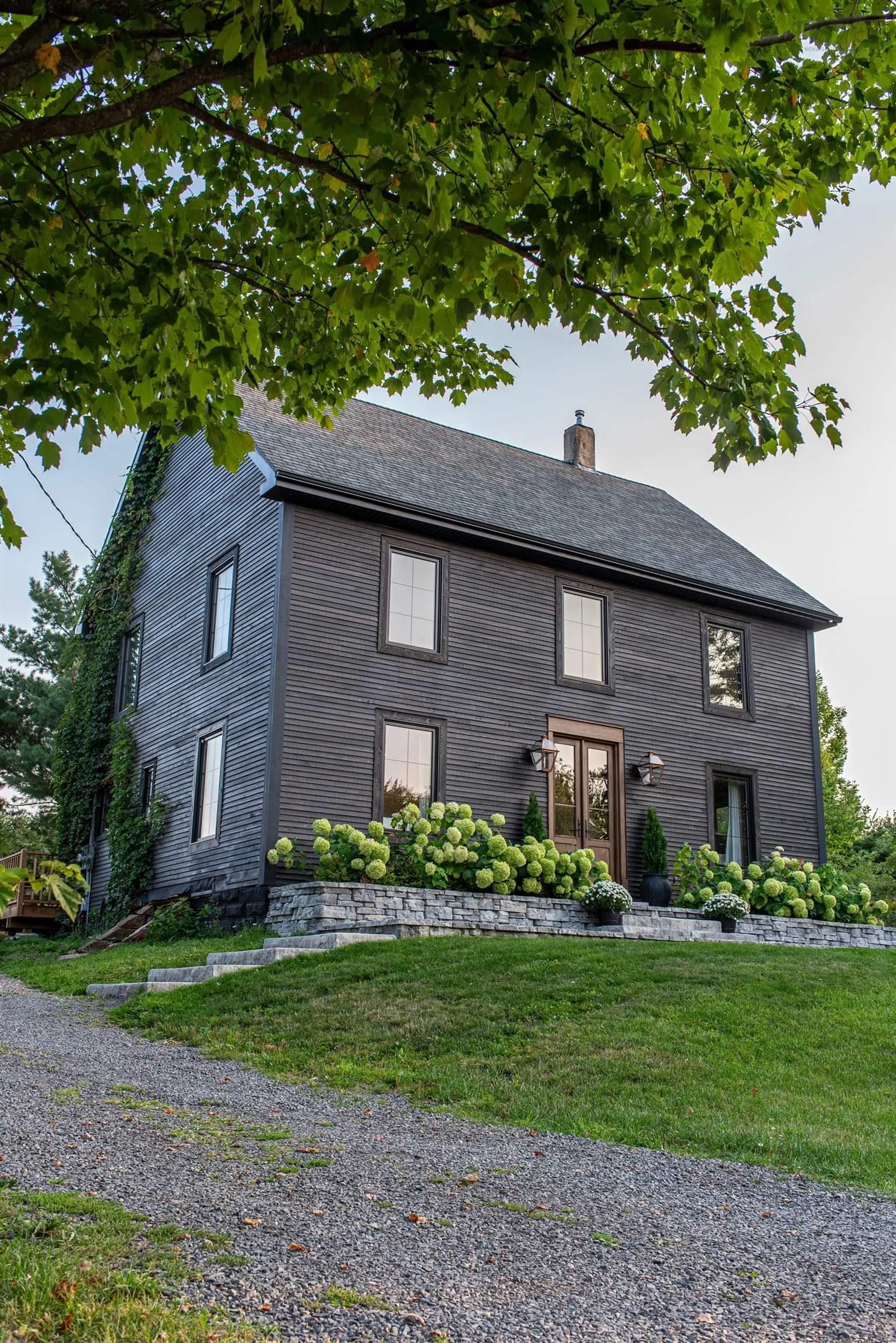 Home with brick exterior material, street for 11820 Highway 1, Grand Pré Nova Scotia B0P 1M0