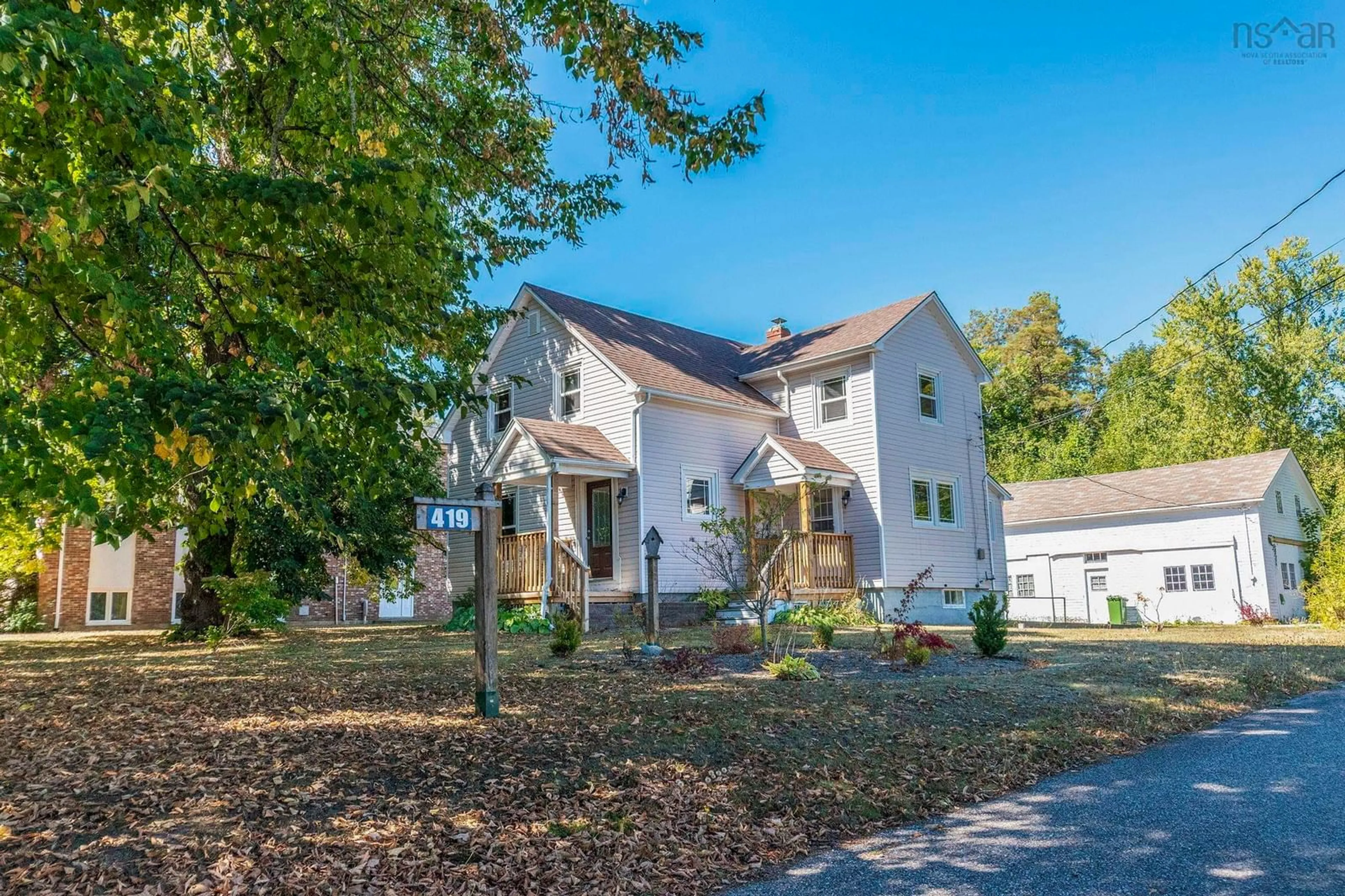 A pic from outside/outdoor area/front of a property/back of a property/a pic from drone, street for 419 Main St, Middleton Nova Scotia B0S 1M0