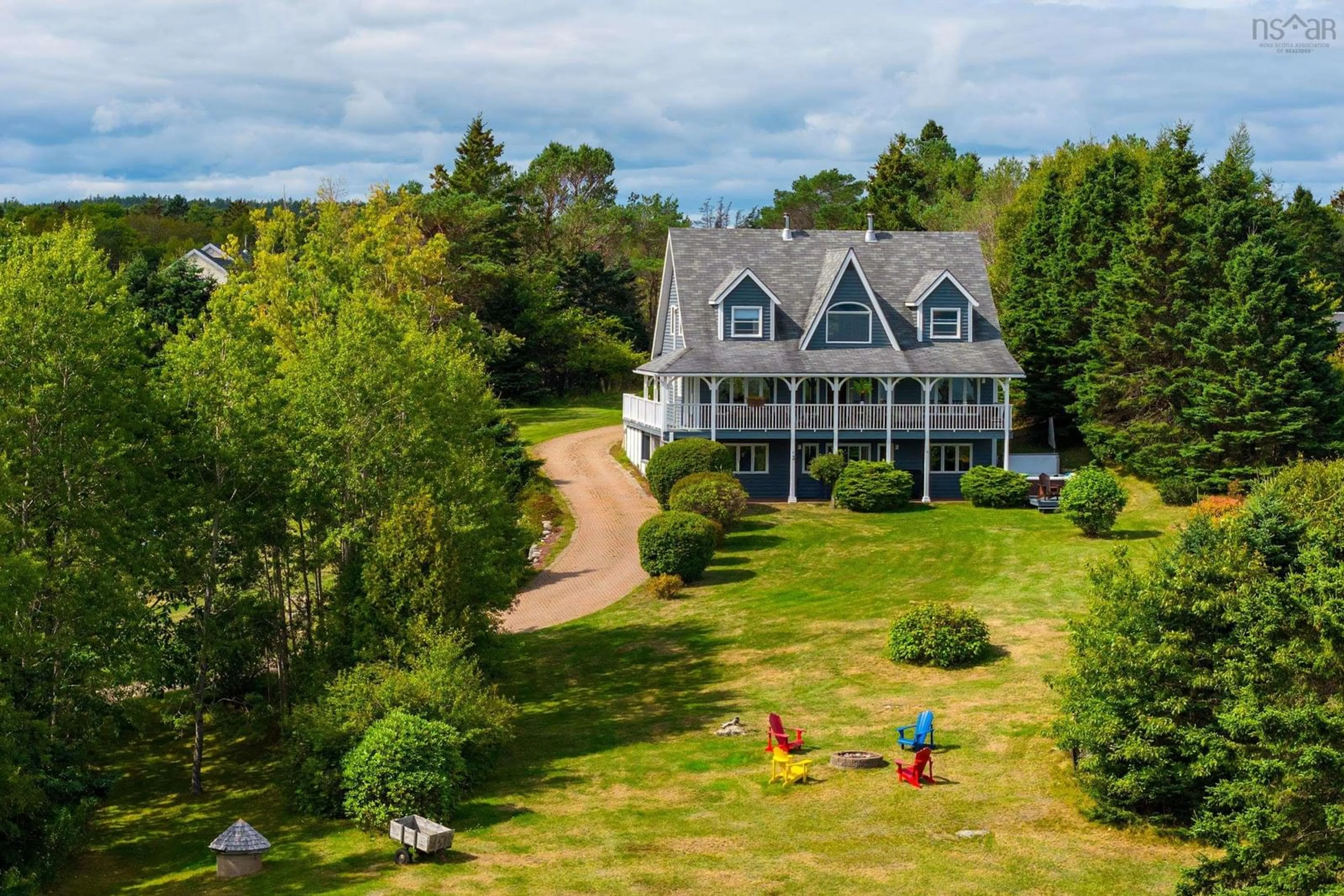 A pic from outside/outdoor area/front of a property/back of a property/a pic from drone, water/lake/river/ocean view for 19 Graves Island Rd, East Chester Nova Scotia B0J 1J0