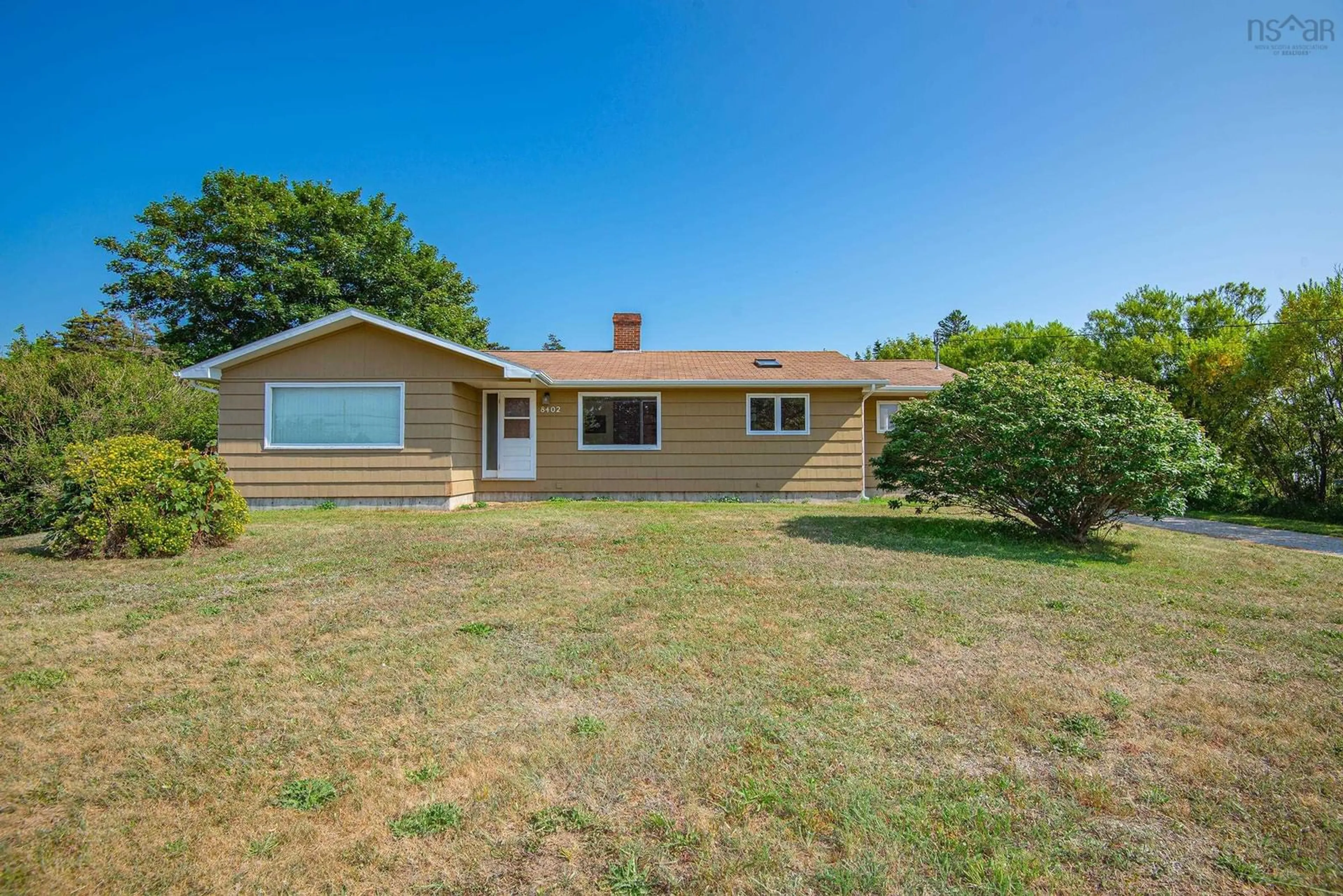 A pic from outside/outdoor area/front of a property/back of a property/a pic from drone, street for 8402 Highway 1, Meteghan Nova Scotia B0W 2J0