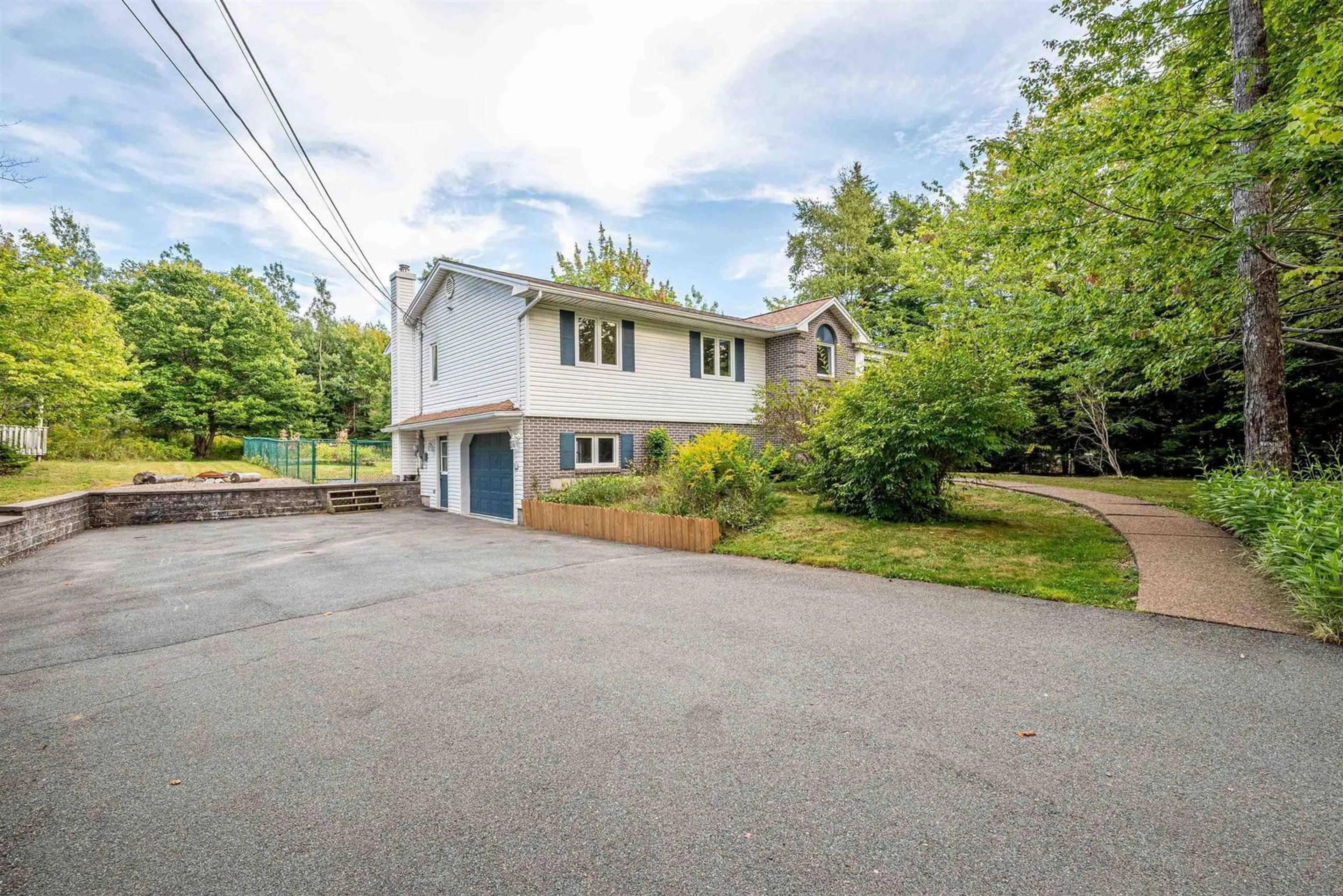 A pic from outside/outdoor area/front of a property/back of a property/a pic from drone, street for 78 Kingswood Dr, Hammonds Plains Nova Scotia B4B 1K4
