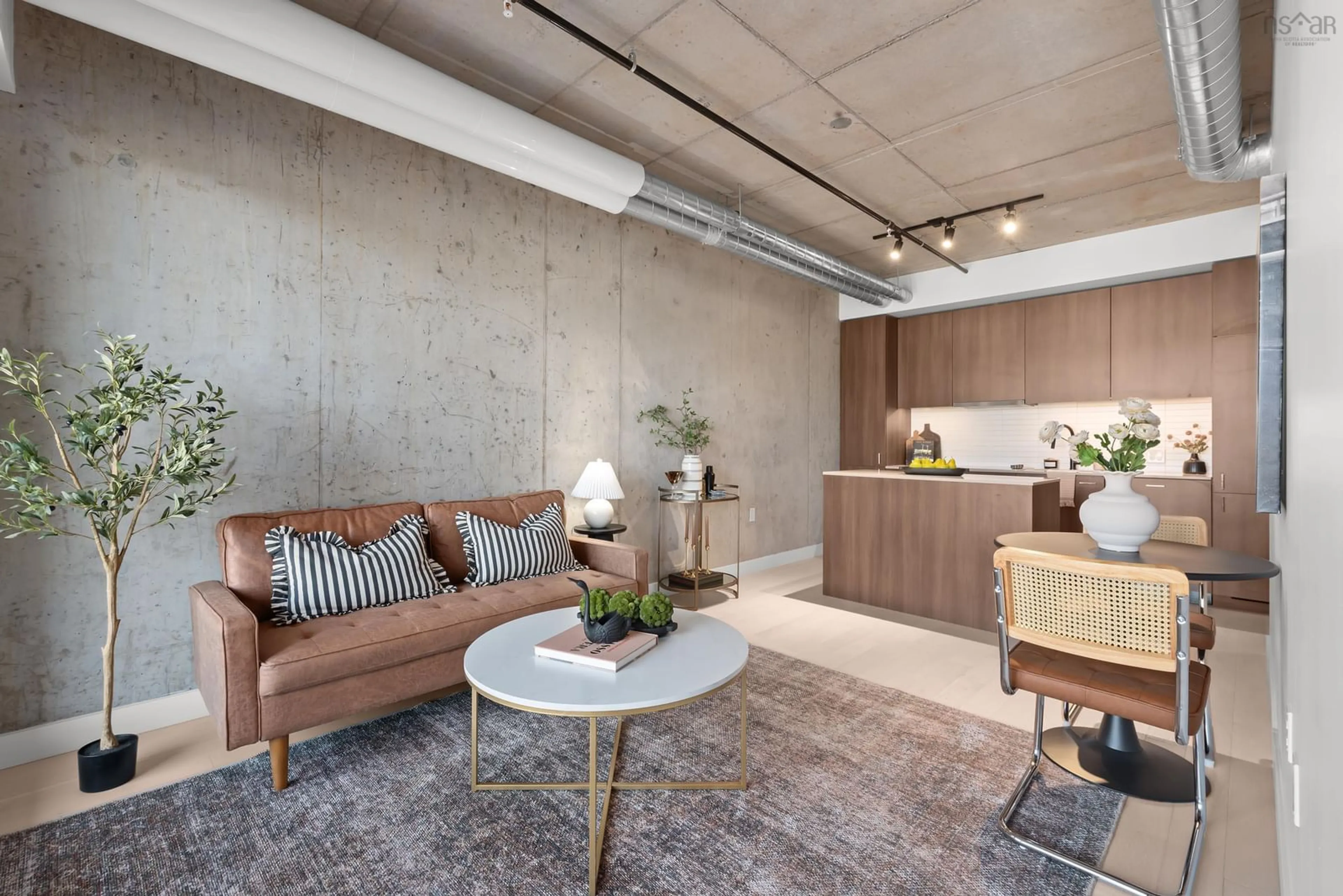 Living room with furniture, cement floor for 5511 Bilby St #309, Halifax Nova Scotia B3K 0M5