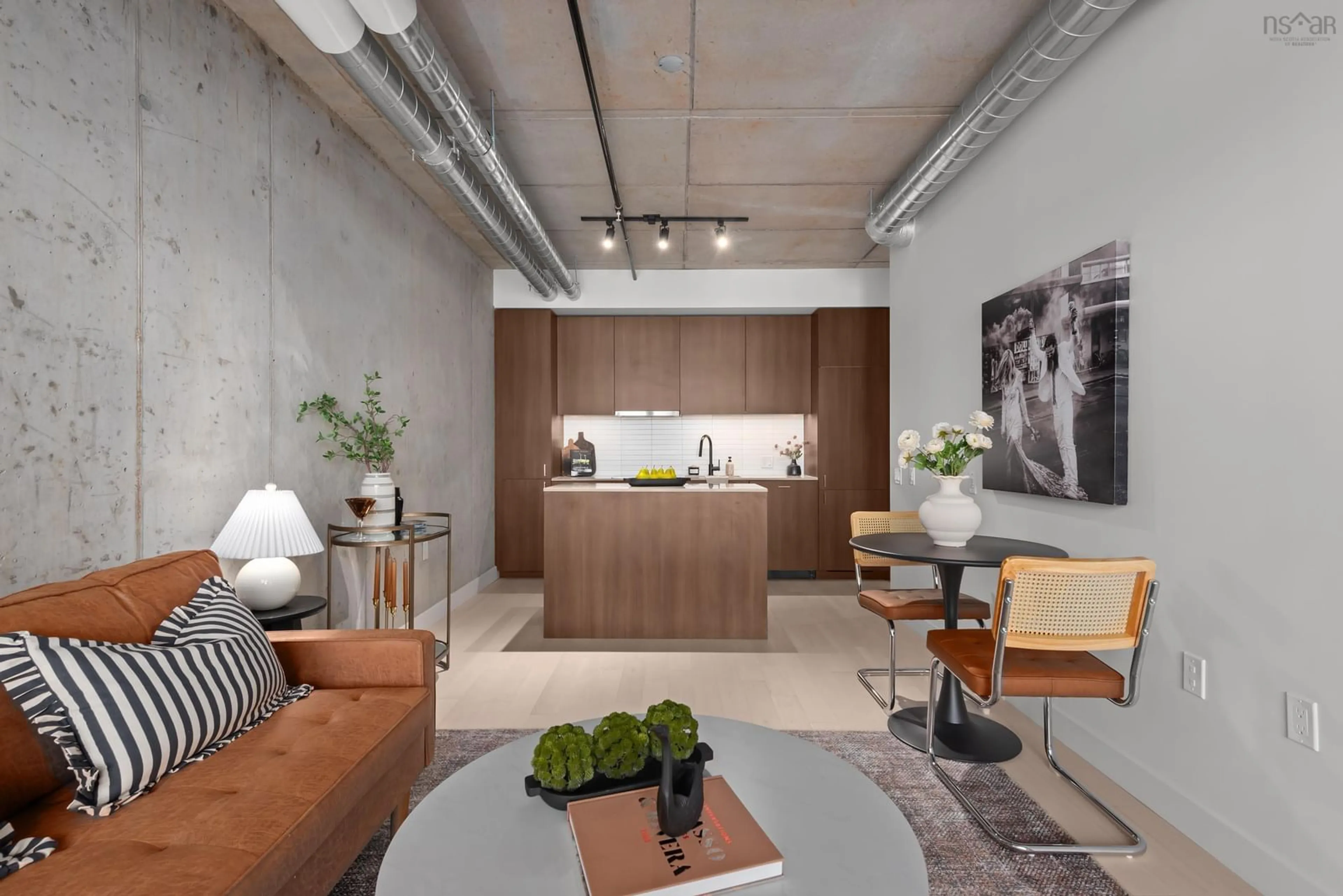 Open concept kitchen, cement floor for 5511 Bilby St #309, Halifax Nova Scotia B3K 0M5